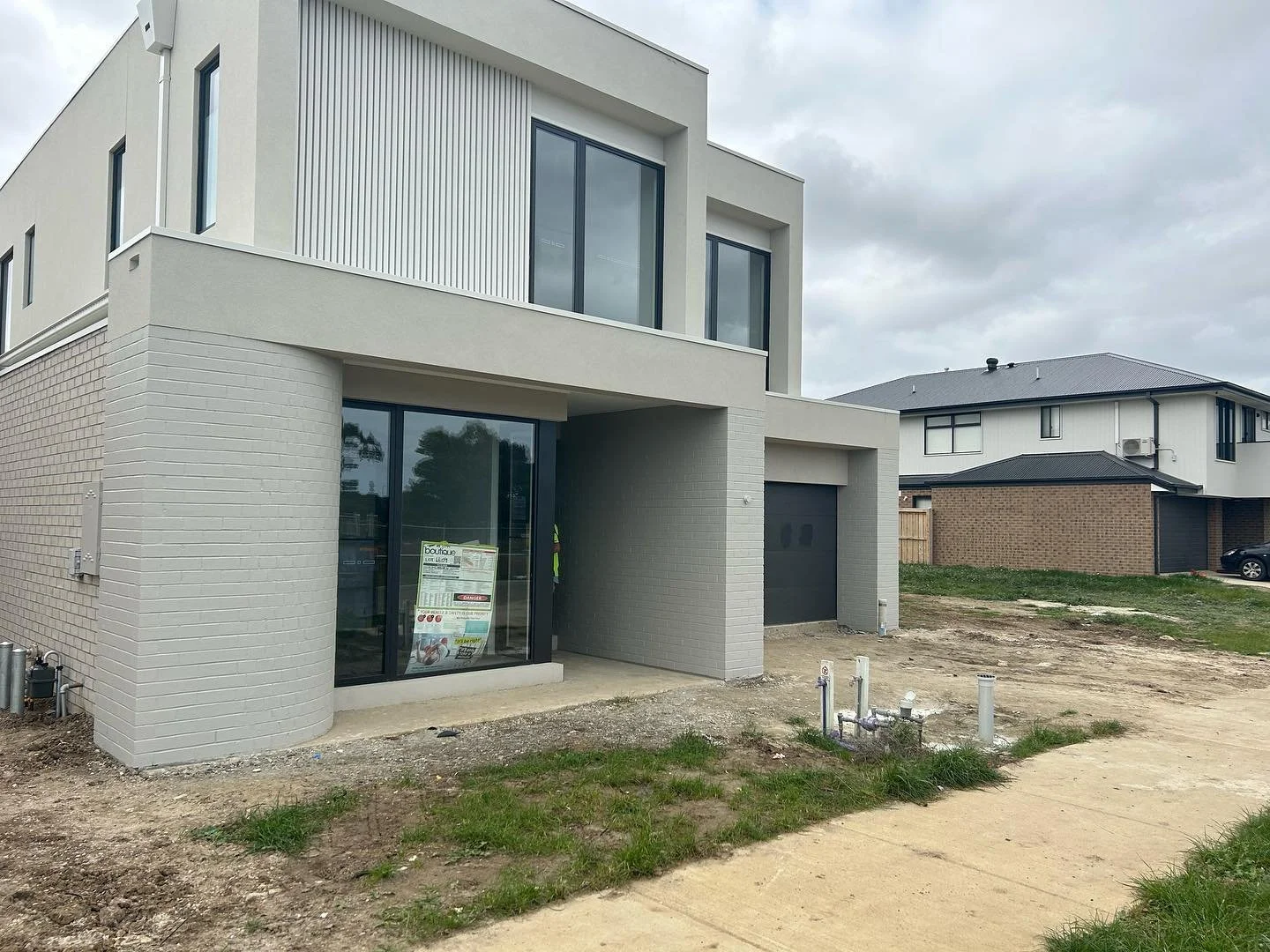 Post wash and paint 
A completed job from earlier this year.
Painted solid facade with curve. Hope the client loves these results