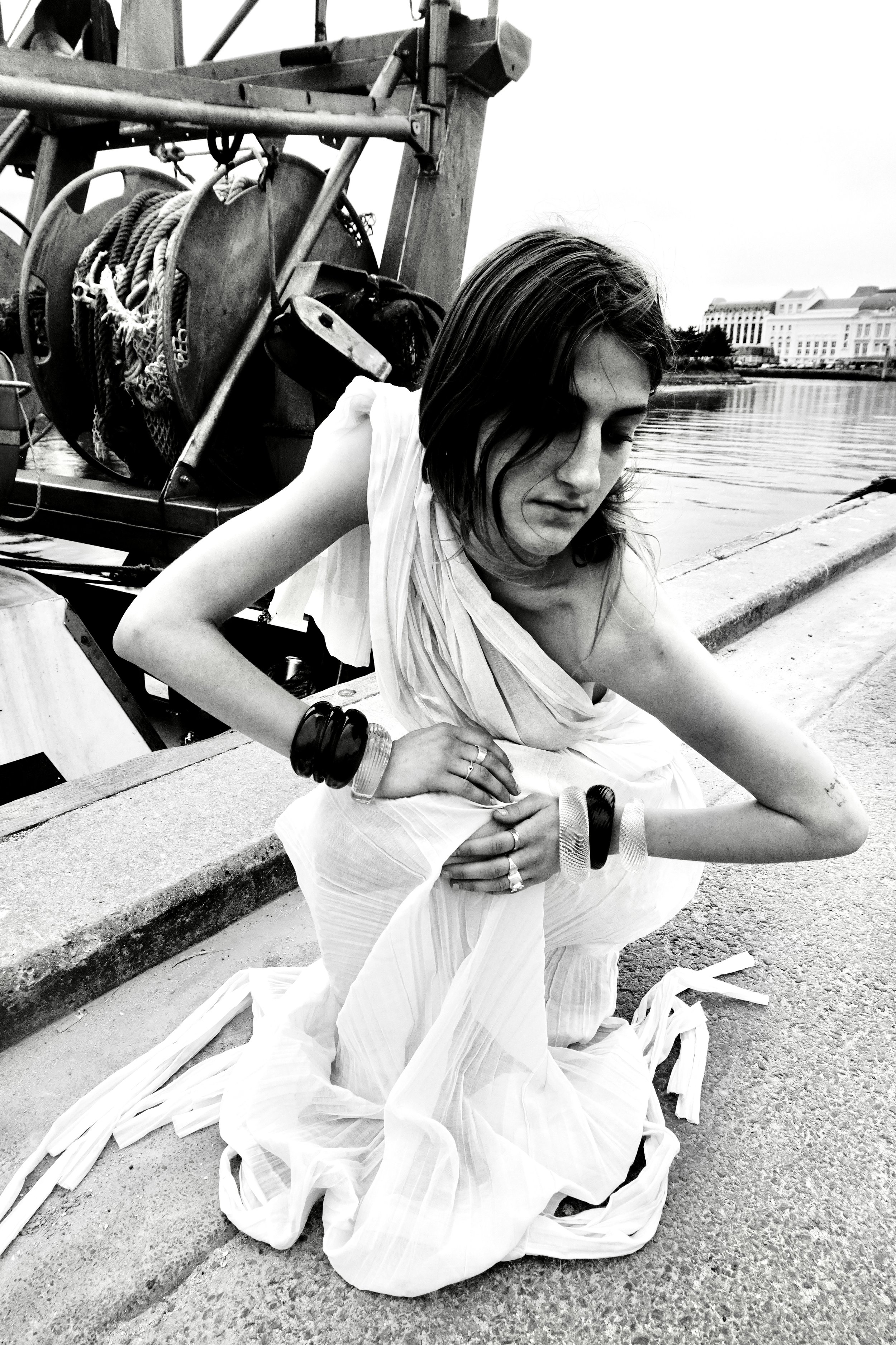 GIRLS IN GLASS #2 Lou wear the Amber ROMAN cuff and Clear ILLUSION cuffs and one OPTICAL cuff dress & photos by Ellison Baus Trouville-Sur-Mer 2024