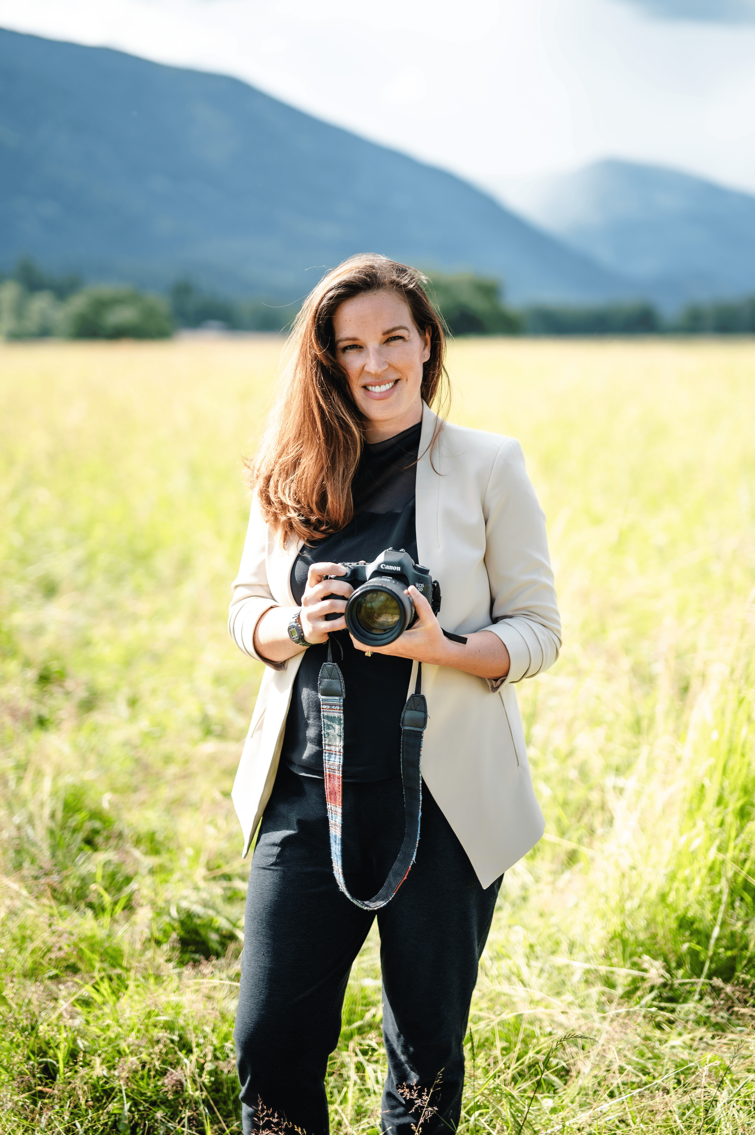 Abby Hubert holding a camera