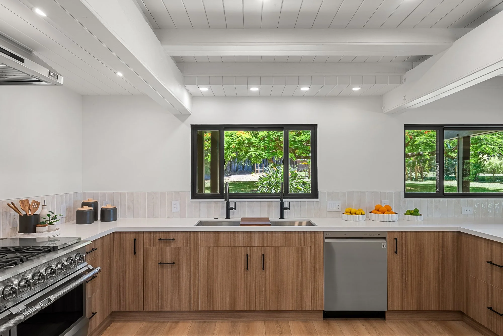 Tropical garden and flowering trees viewed from a Maui residence in Haiku, Hawaii, presented by Eva Besselmann.