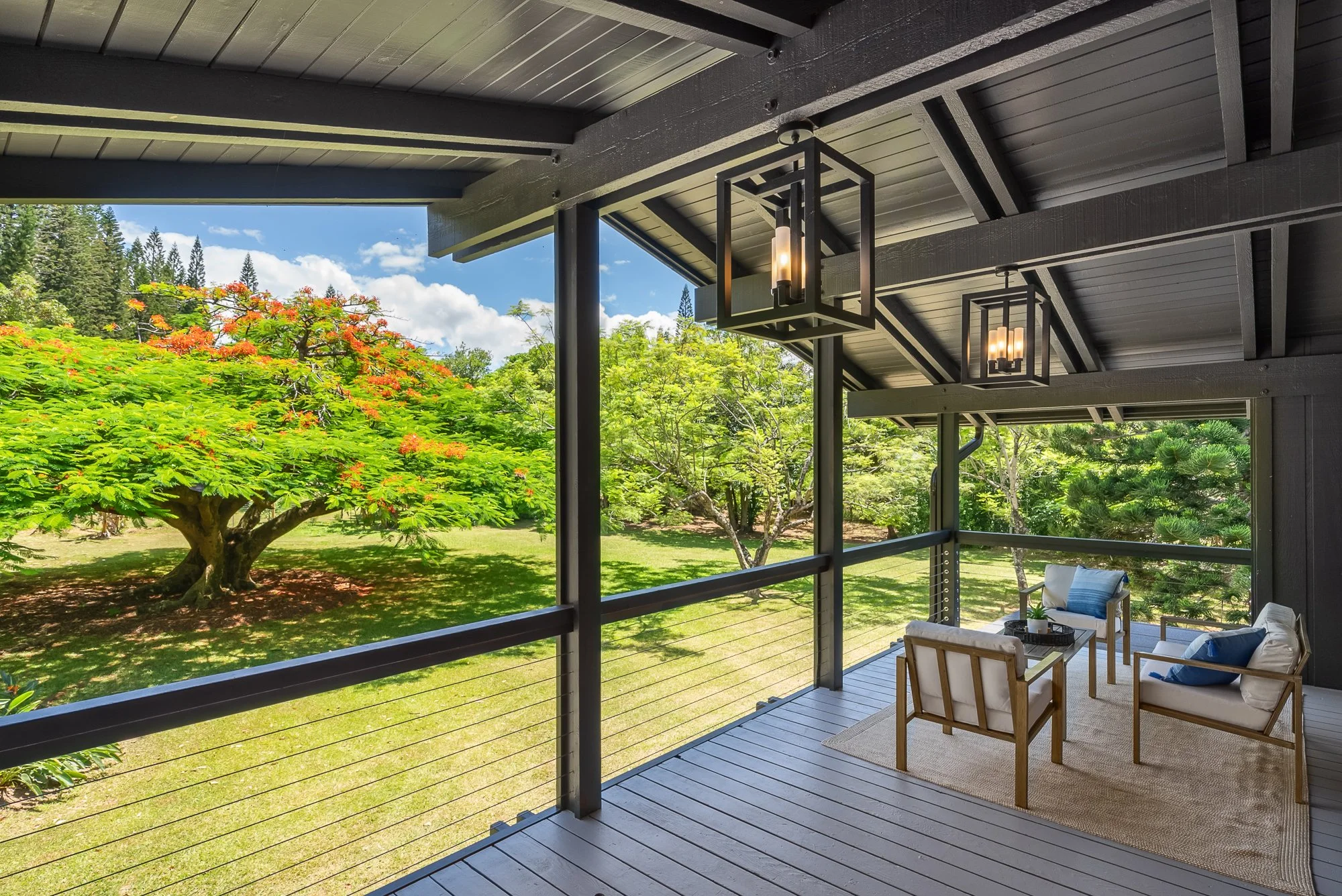 Tropical garden and flowering trees viewed from a Maui residence in Haiku, Hawaii, presented by Eva Besselmann.