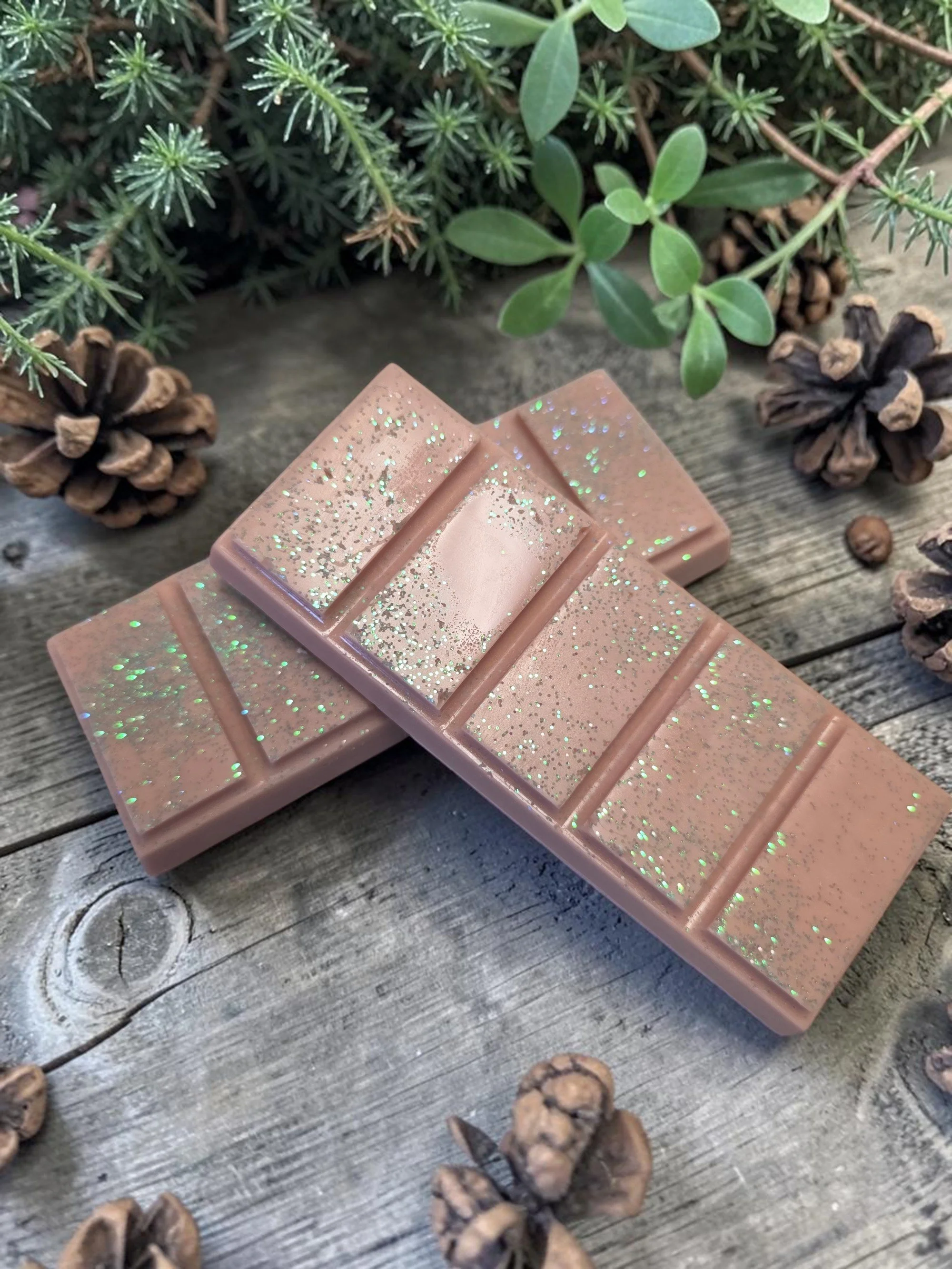 Baby Daddy hand-poured wax melt with pine, earth, and coconut cream scent notes.