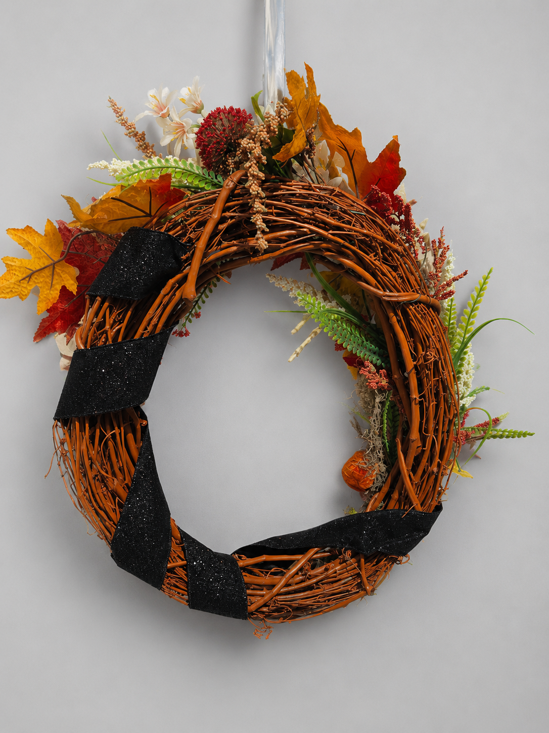 back of seasonal front door wreath.png