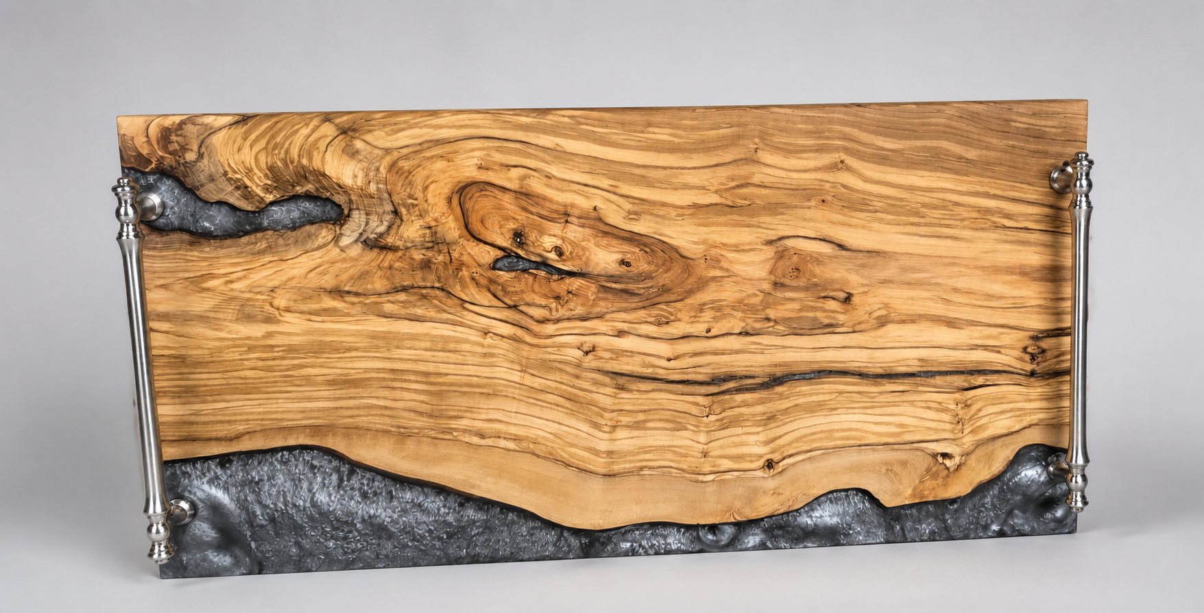 Olivewood serving board with silver epoxy.png