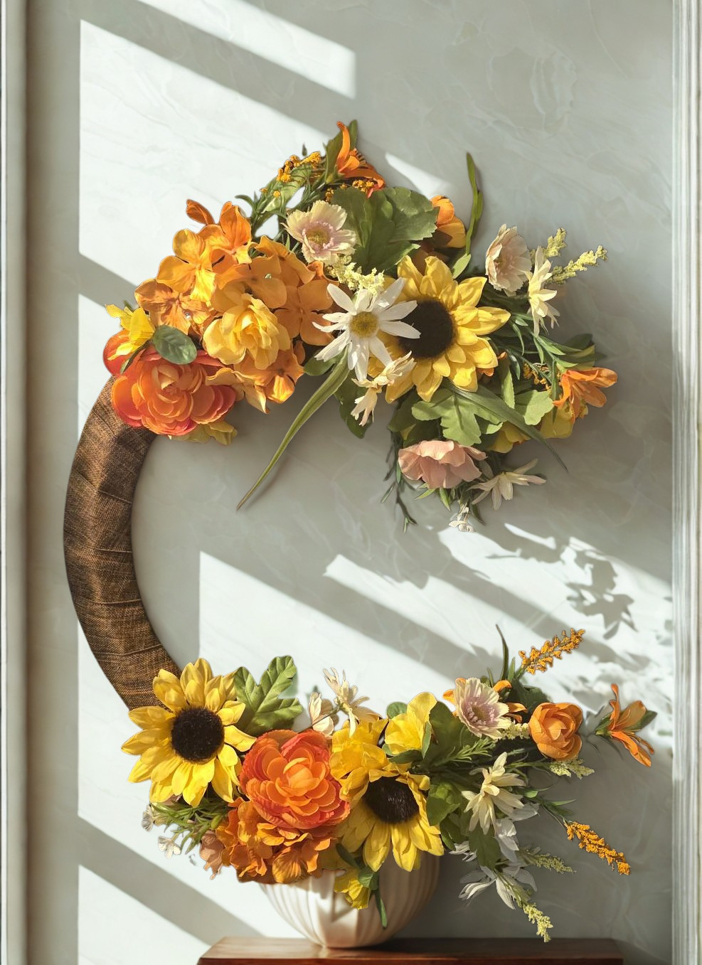 white wall background Crescent front door wreath.png