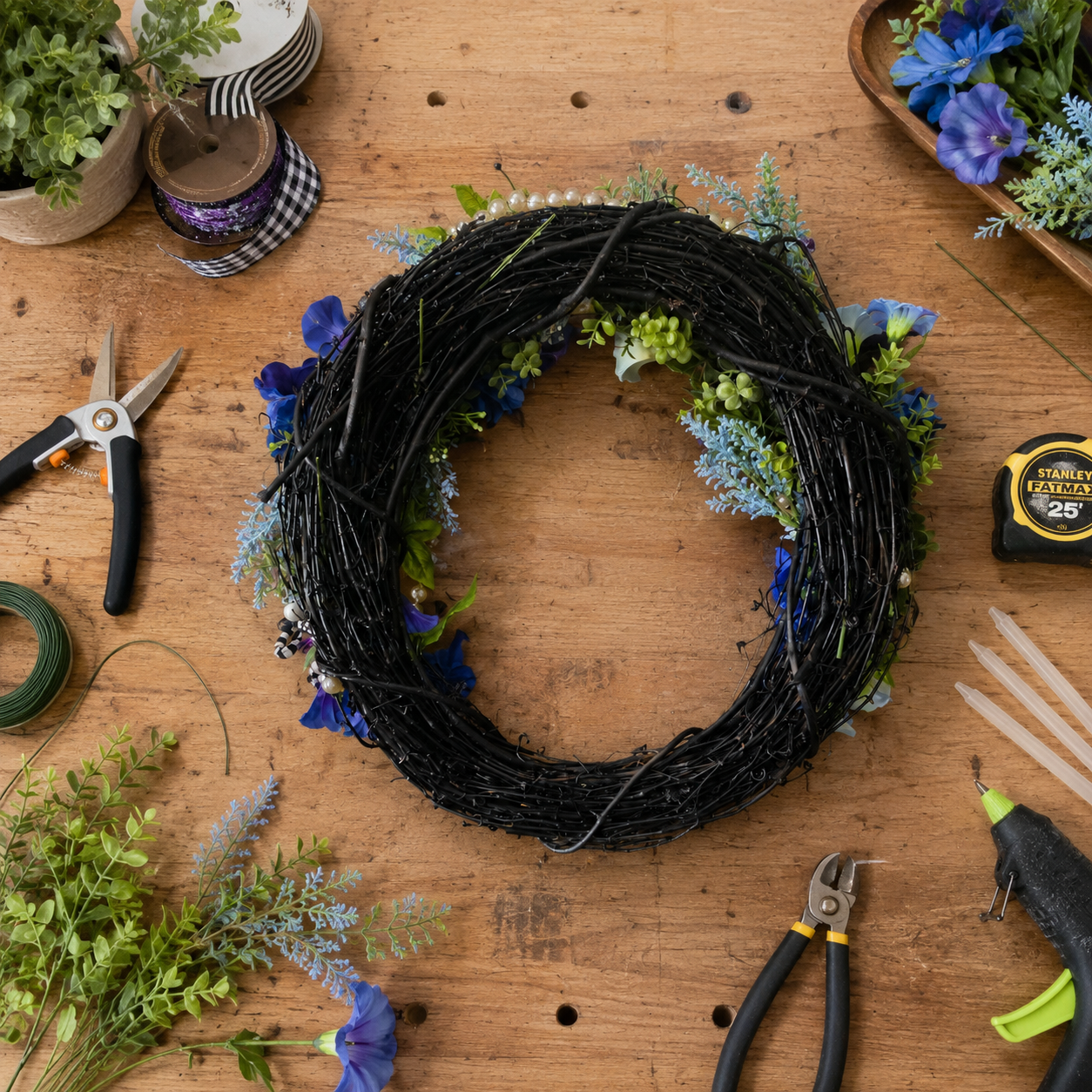 back of halloween Black grapevine wreath.png