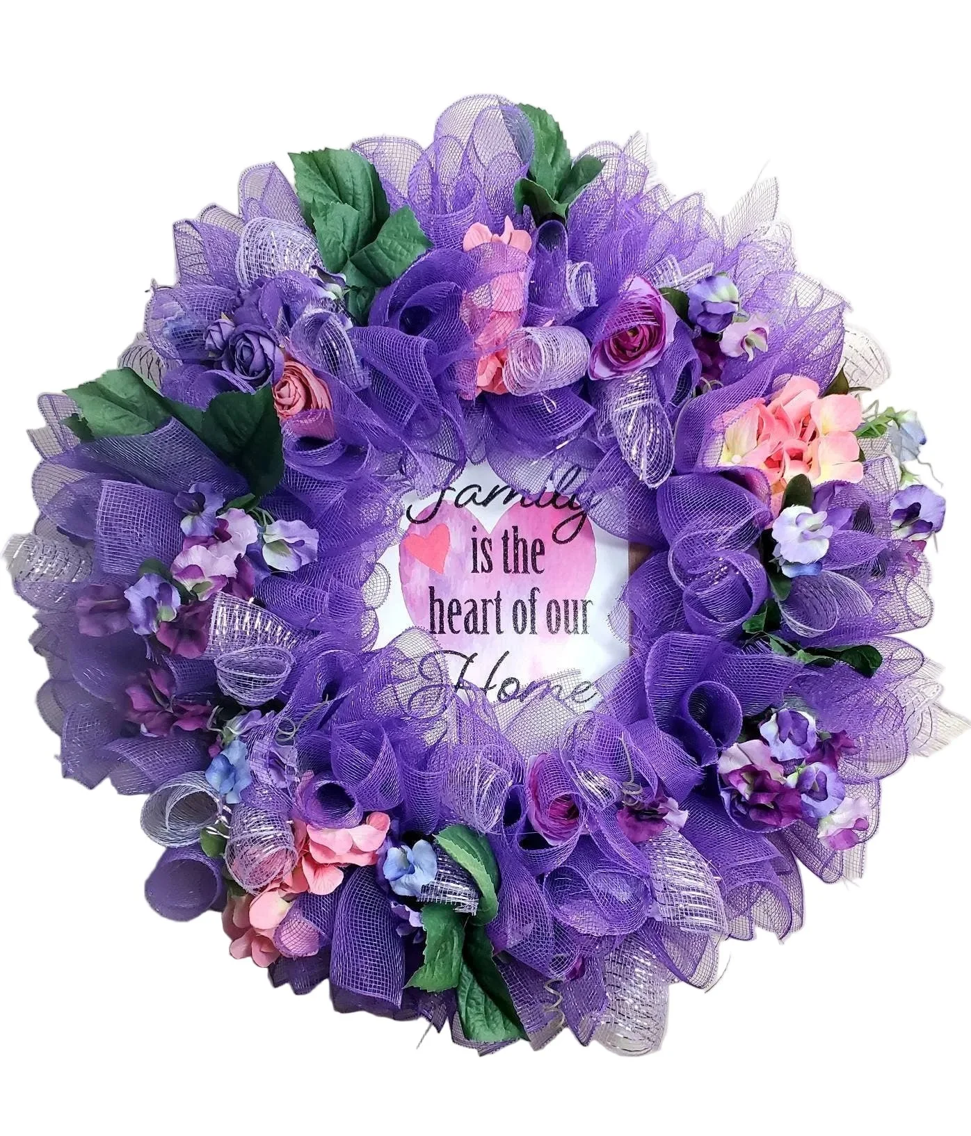 Close-up of artificial florals and mesh wreath details