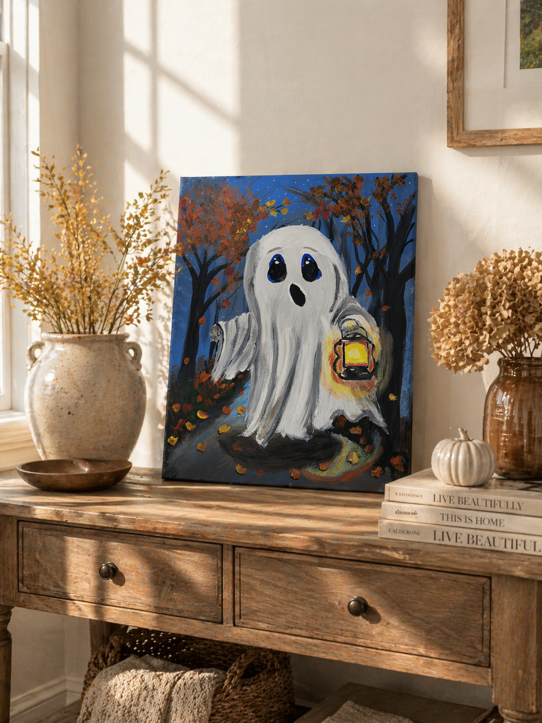 cozy fall ghost canvas on table display.png