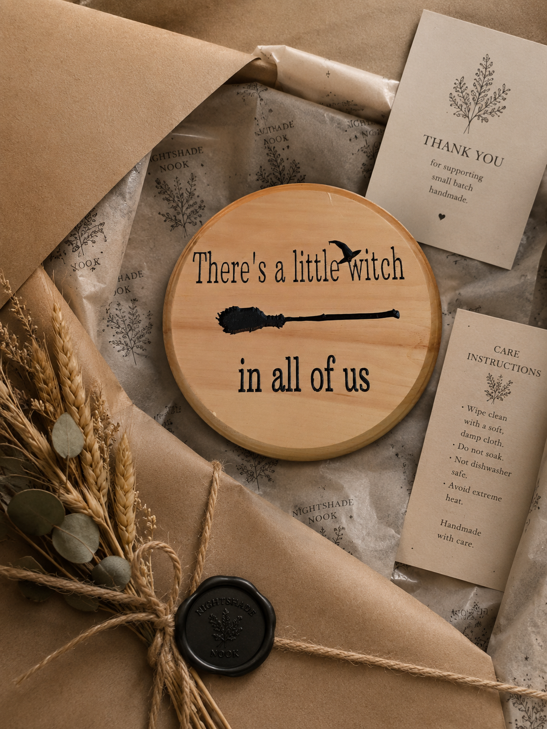 Seasonal Halloween sign with broom silhouette.png