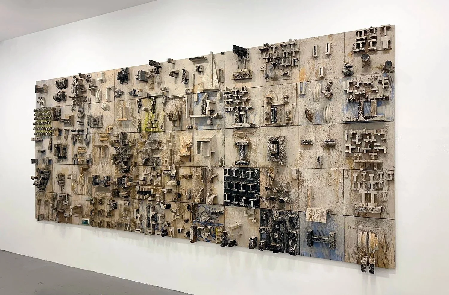 Thomas Sleet
TOPOLOGY, 2026
Wood, plaster, cement, tar, marble dust, earth
90 H x 192 W x 12 D in. (228.6 x 487.7 x 30.5 cm)