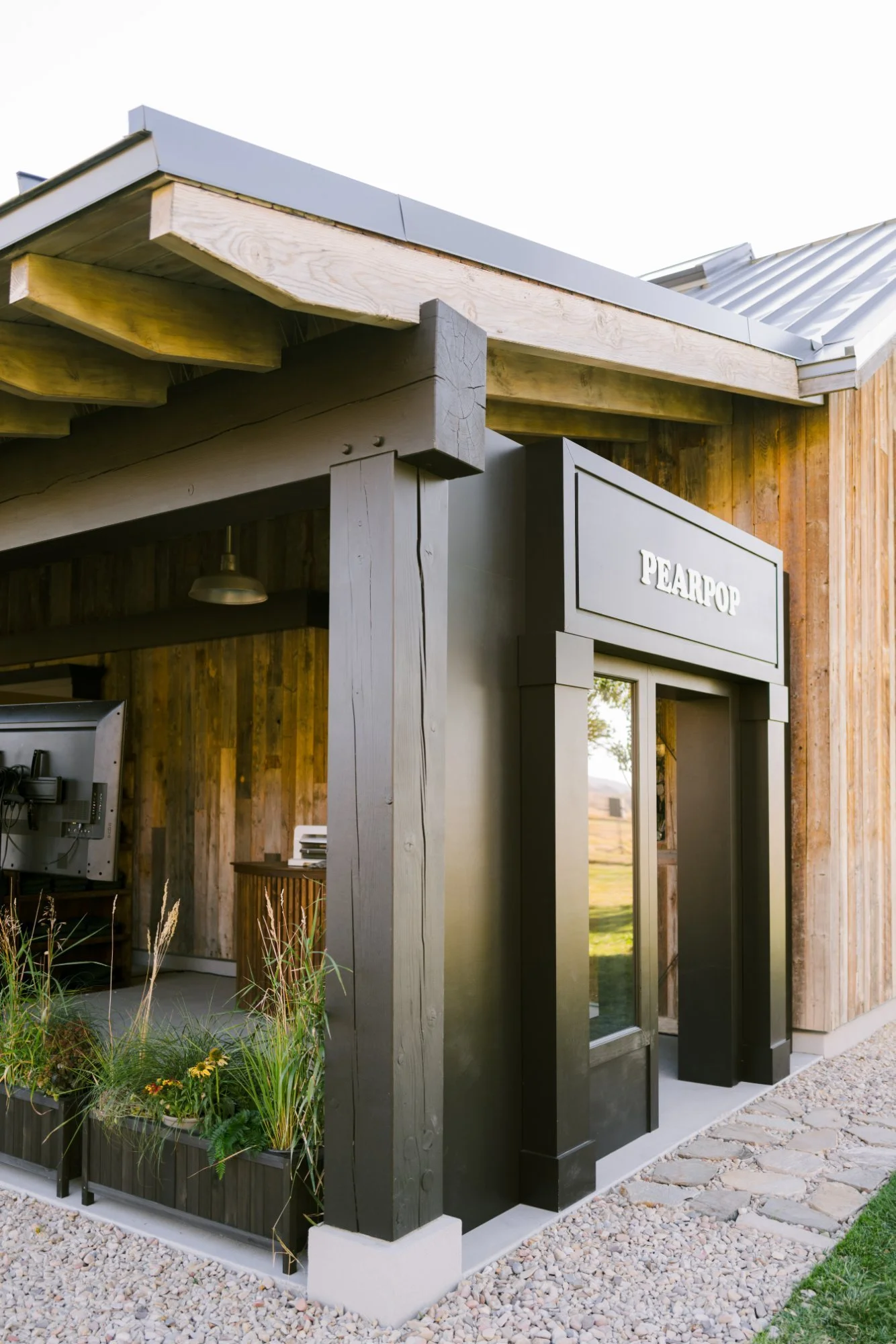 bash-please-utah-investor-community-summit-custom-built-company-facade-reclaimed-barn-wood-signage-corporate-retreat-activation-utah.jpg