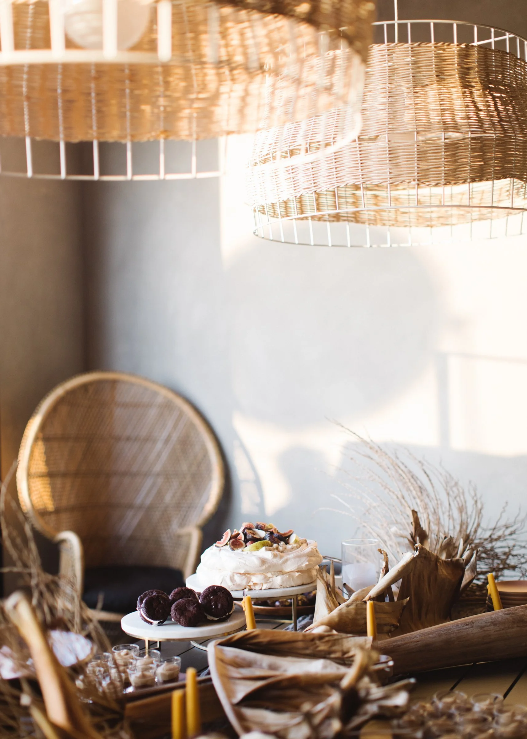 norman-and-blake-launch-gathering-los-angeles-dessert-table-fig-pavlova-whoopie-pies-woven-rattan-pendant-lights-peacock-chair.jpg