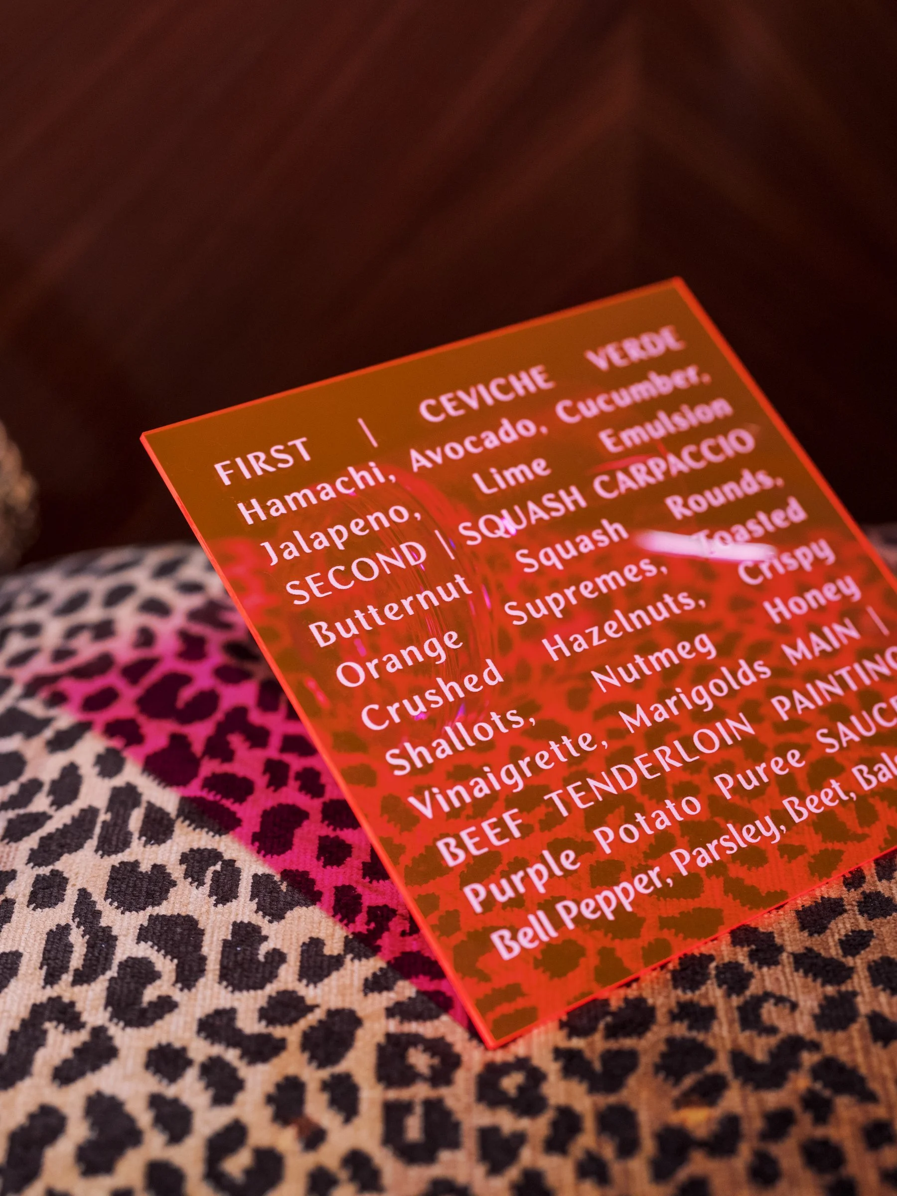 bash-please-faena-miami-corporate-milestone-celebration-neon-acrylic-menu-leopard-print-luxury-corporate-dinner-design.jpg