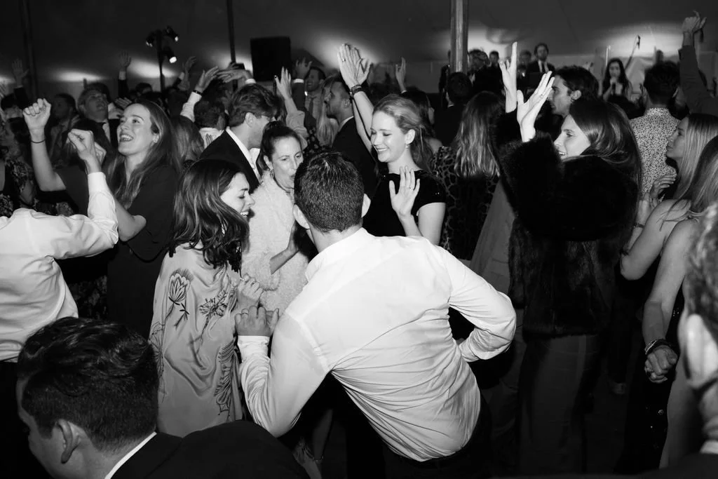 Guests dancing during a luxury wedding reception planned by Bash Please, capturing an energetic celebration.