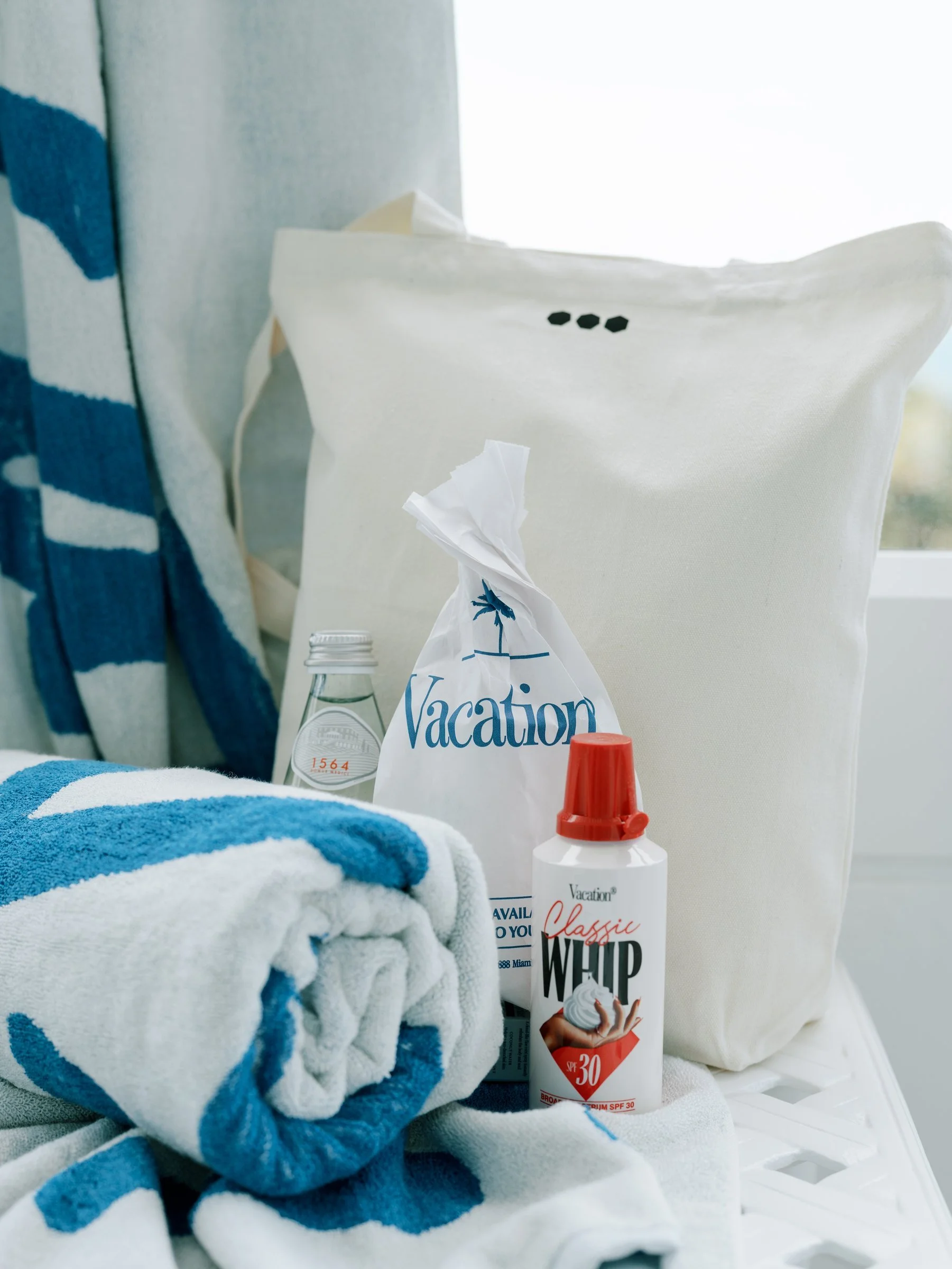bash-please-faena-miami-corporate-milestone-celebration-miami-welcome-gift-beach-tote-vacation-sunscreen-corporate-event-swag.jpg