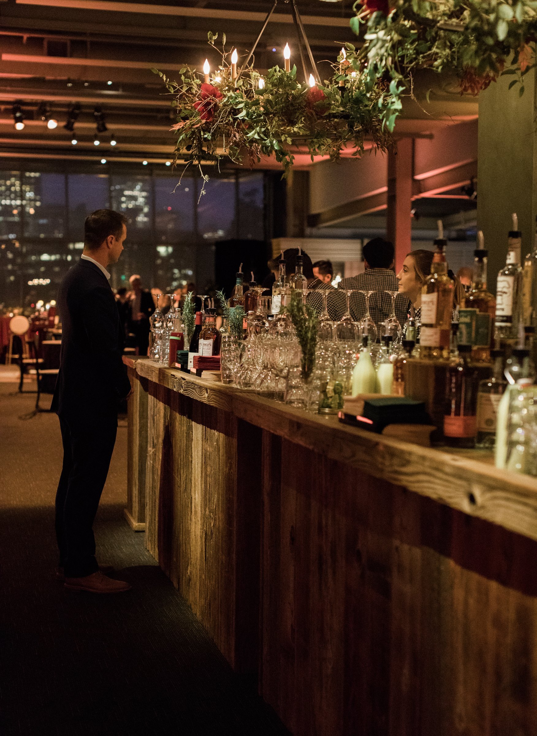 bay-area-corporate-holiday-party-reclaimed-wood-bar-botanical-chandelier-greenery-candlelit-corporate-holiday-party-san-francisco.jpg