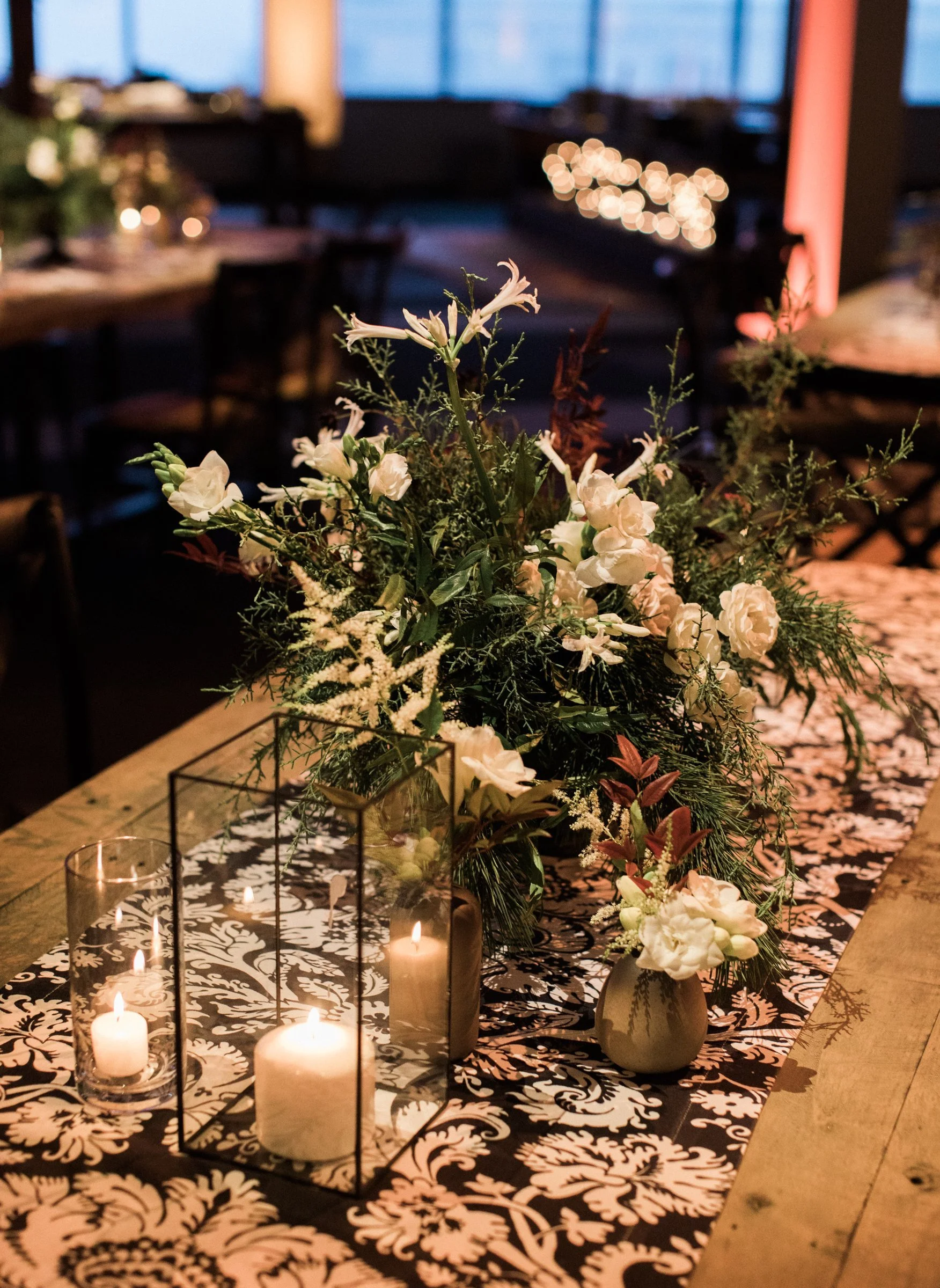bay-area-corporate-holiday-party-winter-greenery-white-freesia-candle-centerpiece-damask-runner-corporate-holiday-dinner-san-francisco.jpg
