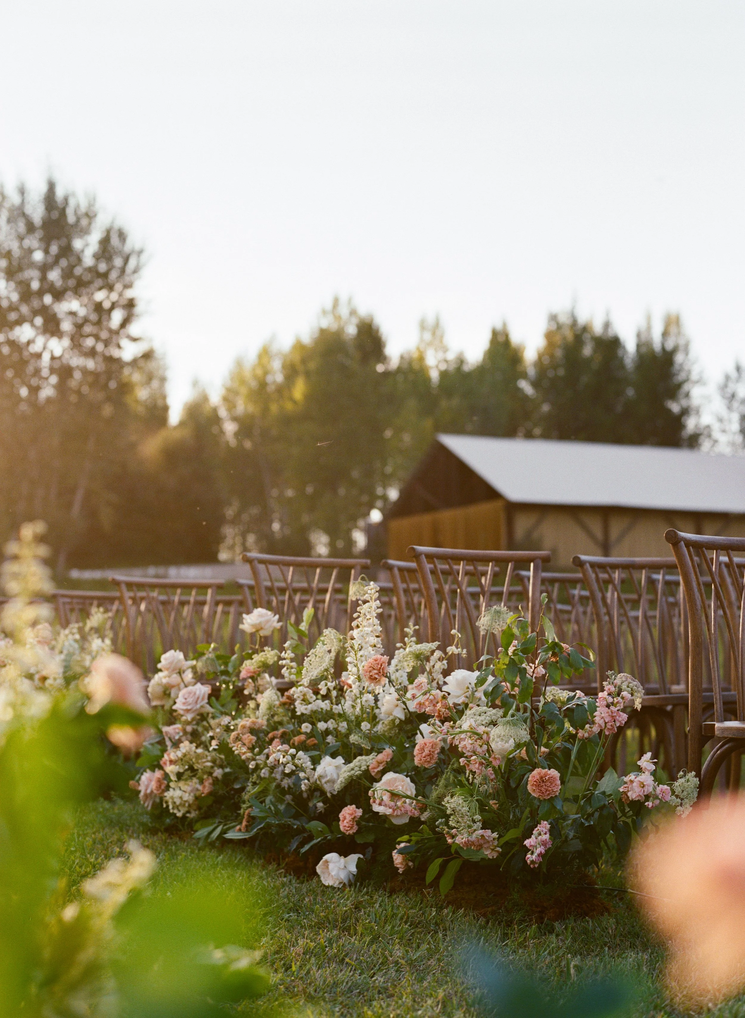 Floral lined ceremony site in Whitefish, Montana
