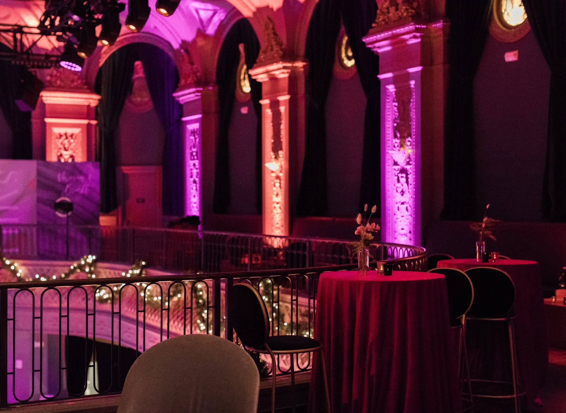 bay-area-corporate-holiday-party-historic-theater-balcony-lounge-velvet-cocktail-tables-uplighting-company-holiday-party-san-francisco.jpg