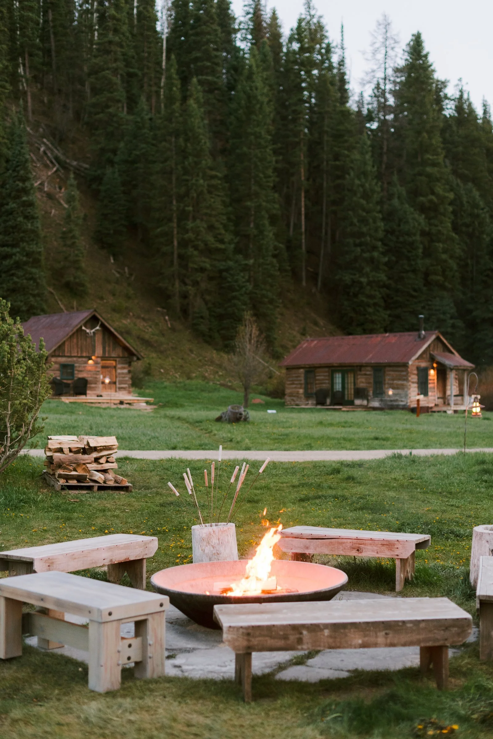 bash-please-dutton-ranch-corporate-retreat-firepit-gathering-historic-log-cabins-dutton-hot-springs-high-end-corporate-event-design.jpg