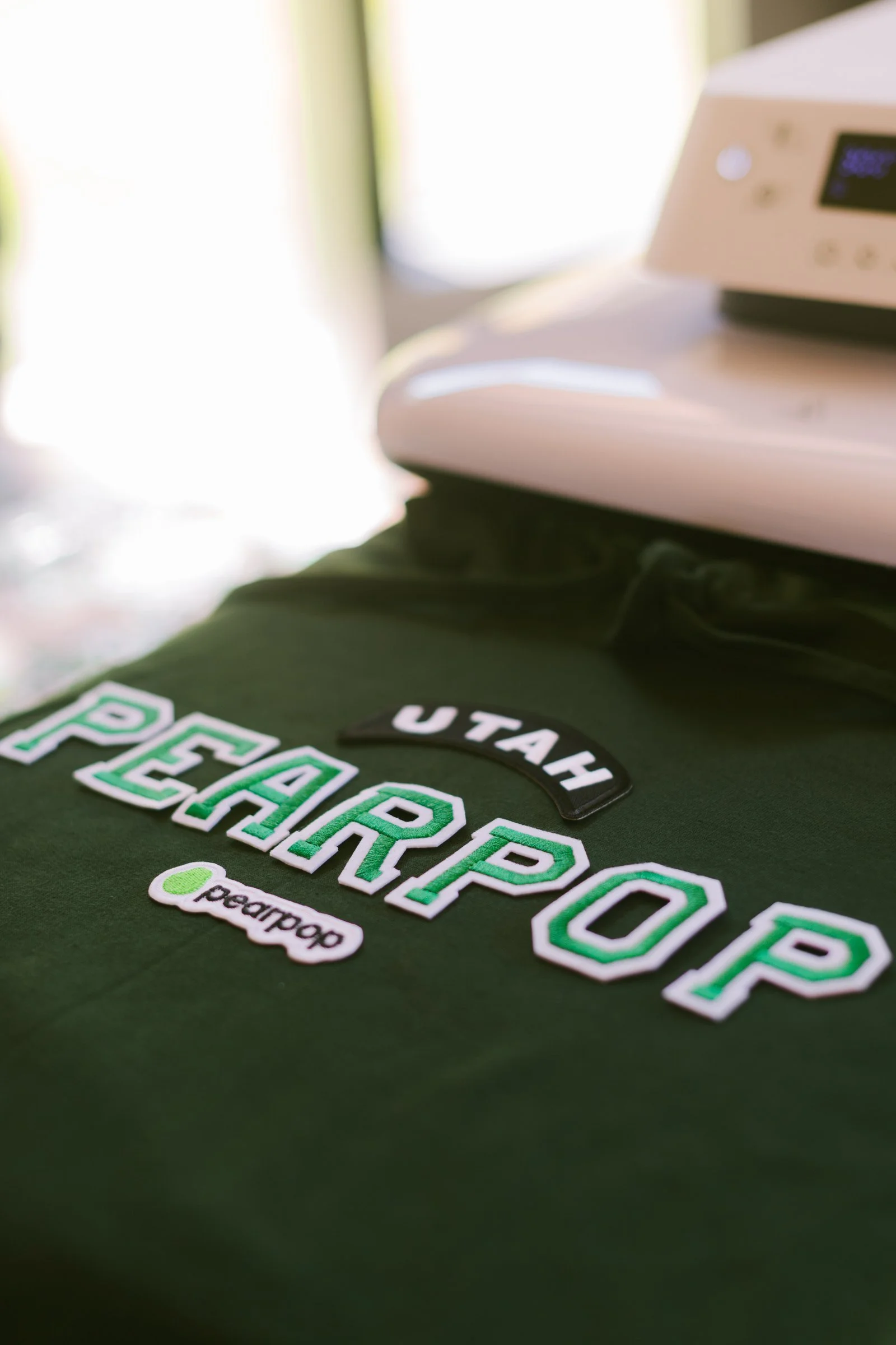 bash-please-utah-investor-community-summit-custom-embroidered-patch-sweatshirt-heat-press-pop-up-retail-activation.jpg