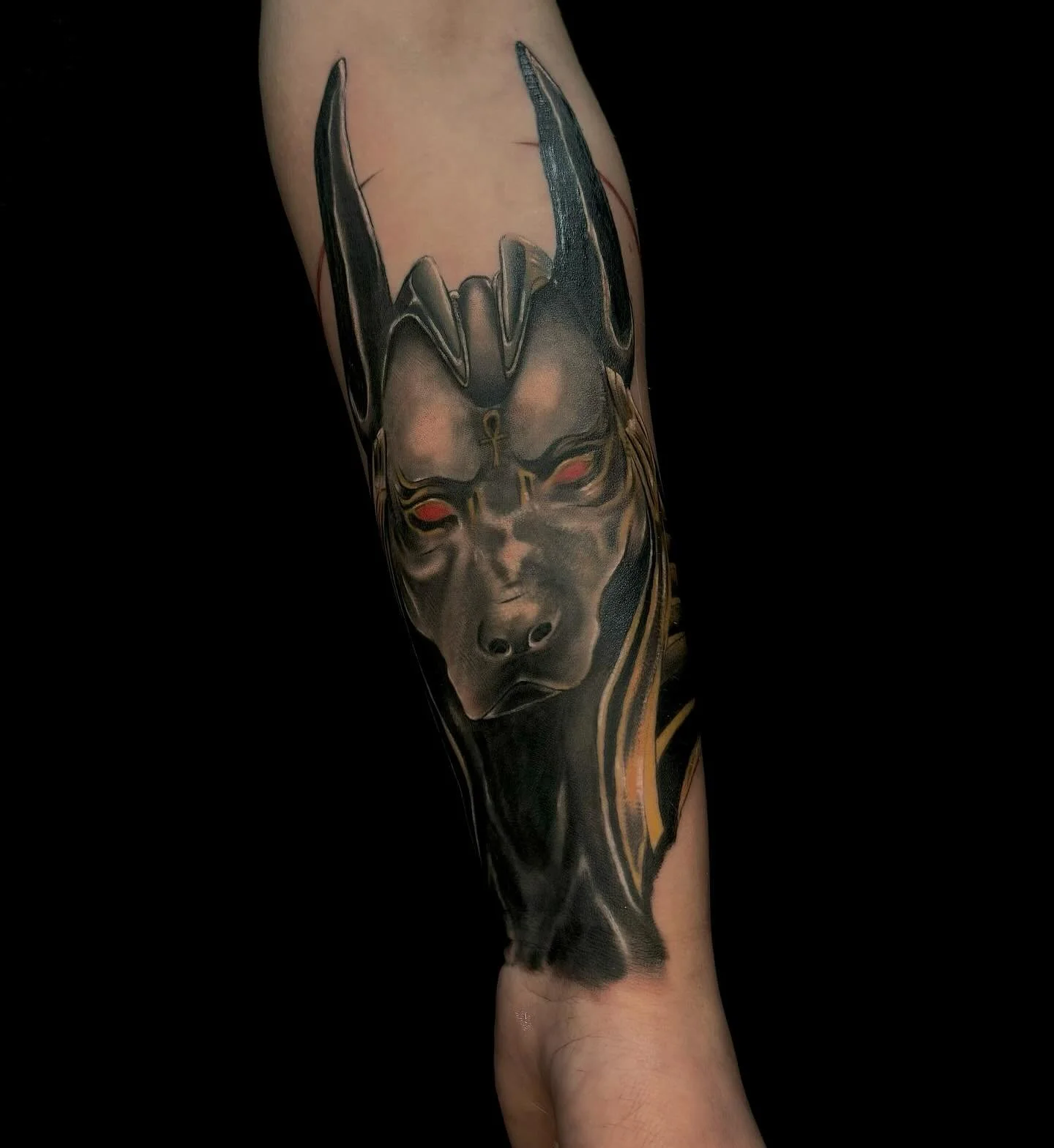 Huge thanks to our amazing client for visiting Obsidian Ink Tattoo Studio! We hope you love your new Anubis cover-up tattoo as much as we loved creating it. 🖤 We’d love to do more Egyptian-inspired work like this. Can’t wait to see you a