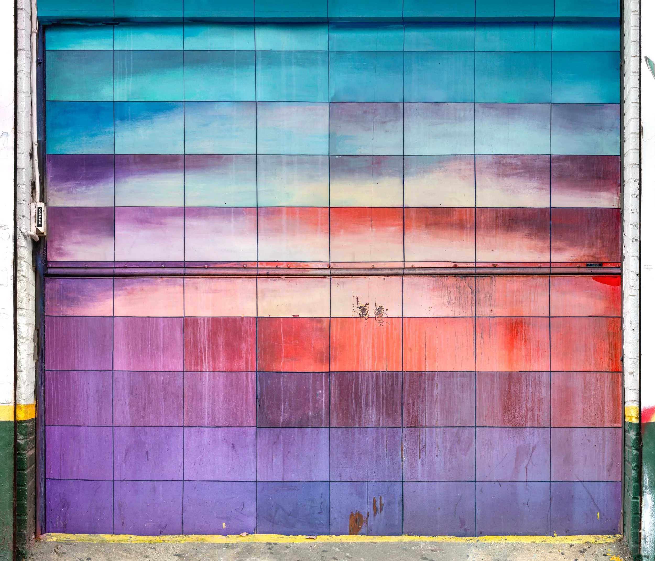 A parking garage gate in Chinatown transformed into a Color Field painting.  Found fine art on the streets of New York City captured by photographer Barton Lewis.