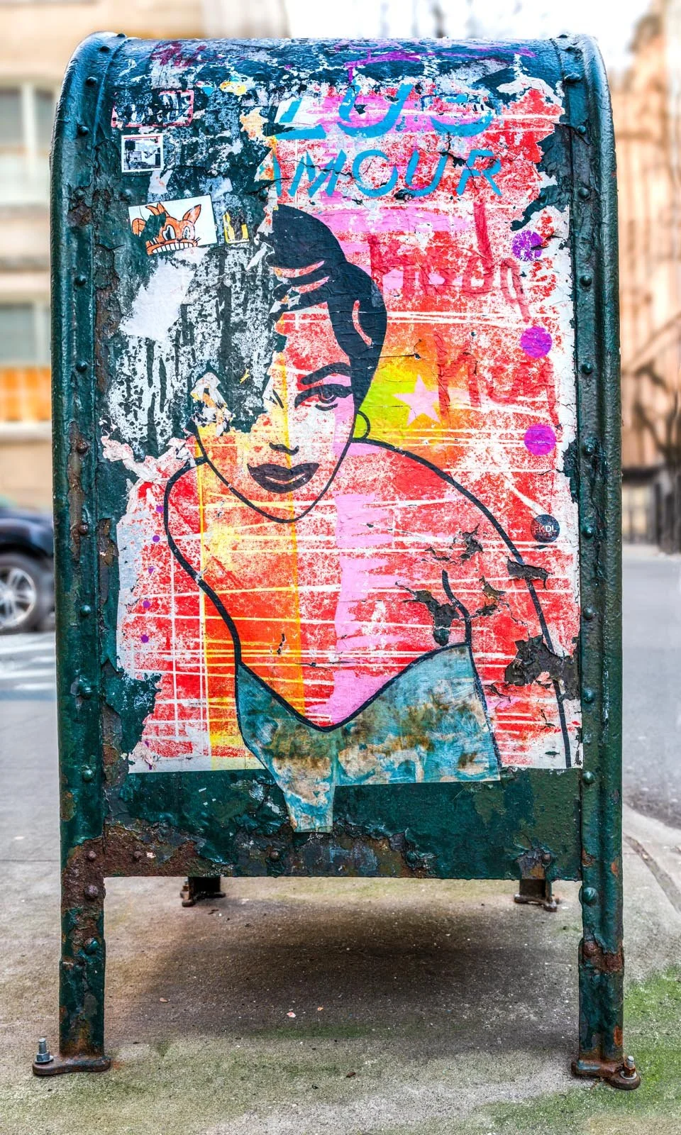 Fine art urban photography print of a public New York City mailbox covered in sticker slaps and graffiti. This photograph of street art collage is captured by contemporary photographer Barton Lewis.