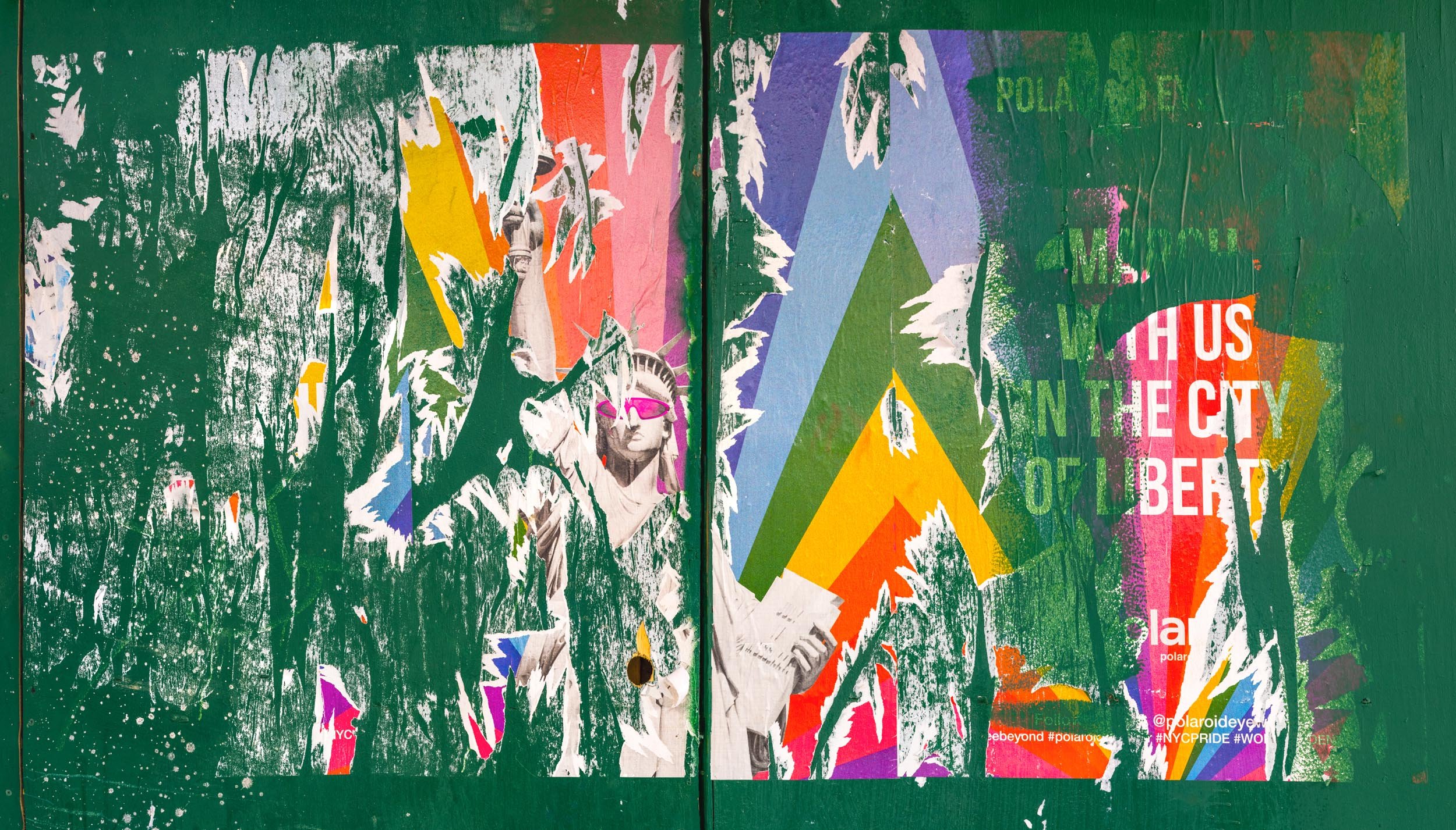 Fine art urban photography capturing decaying advertising posters on a plywood construction site fence. The composition isolates layers of shredded commercial paper, weathered textures, and accidental street art by Barton Lewis.