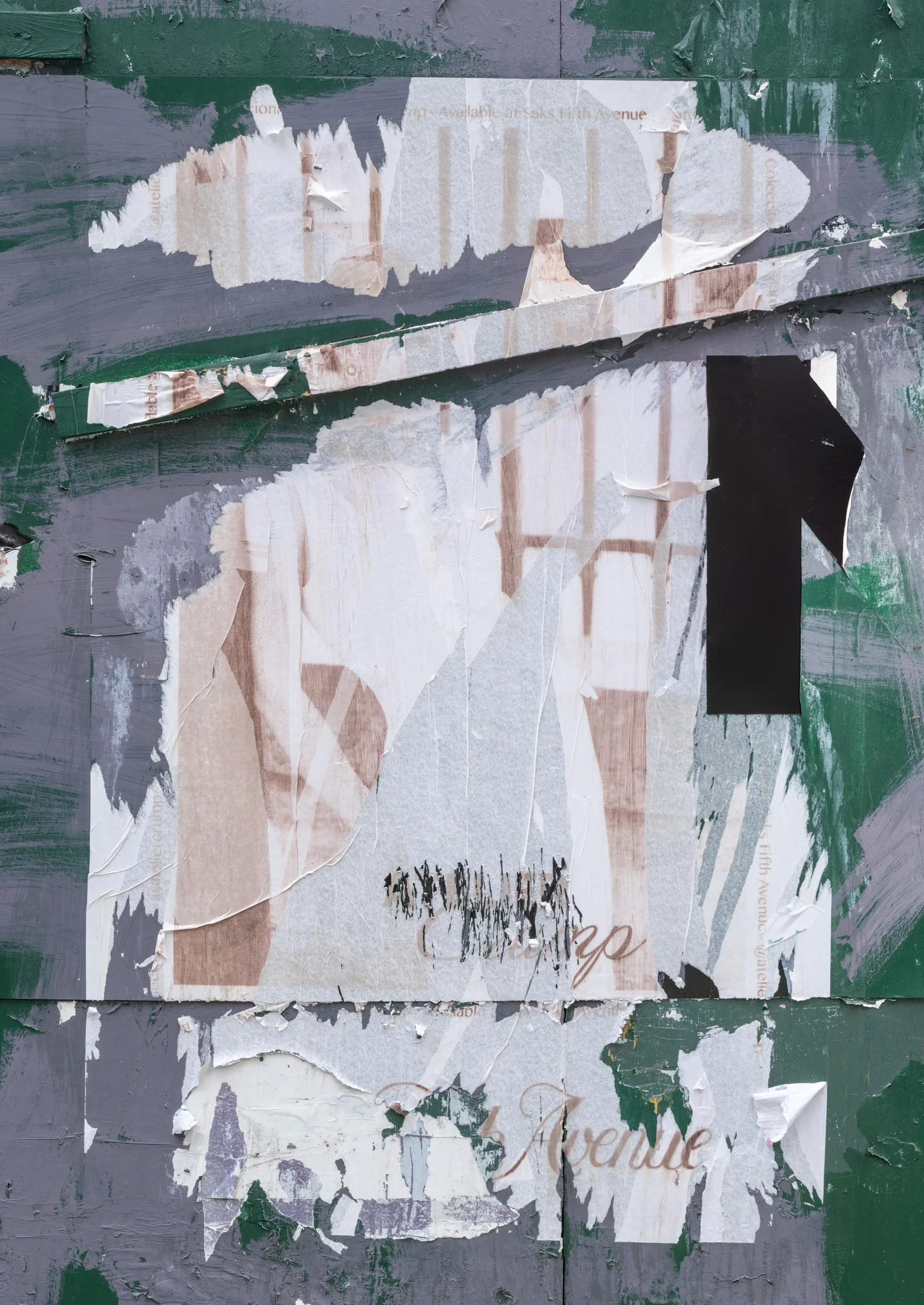 Fine art urban photography capturing decaying advertising posters on a plywood construction site fence. The composition isolates layers of shredded commercial paper, weathered textures, and accidental street art by Barton Lewis.