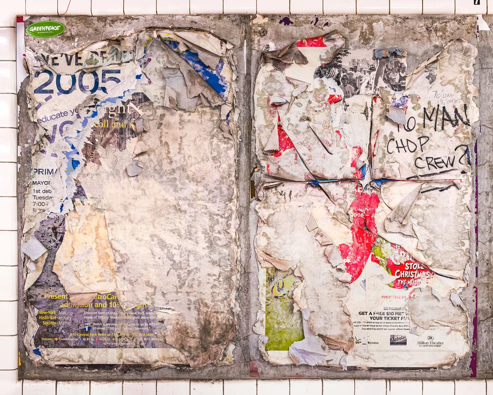 A photograph of a New York City subway advertising panel, showcasing urban decay transformed into fine art. Photographed by Barton Lewis, the image focuses on minimalist, painterly textures, poster fragments, heavily scraped surfaces and faded pigmen