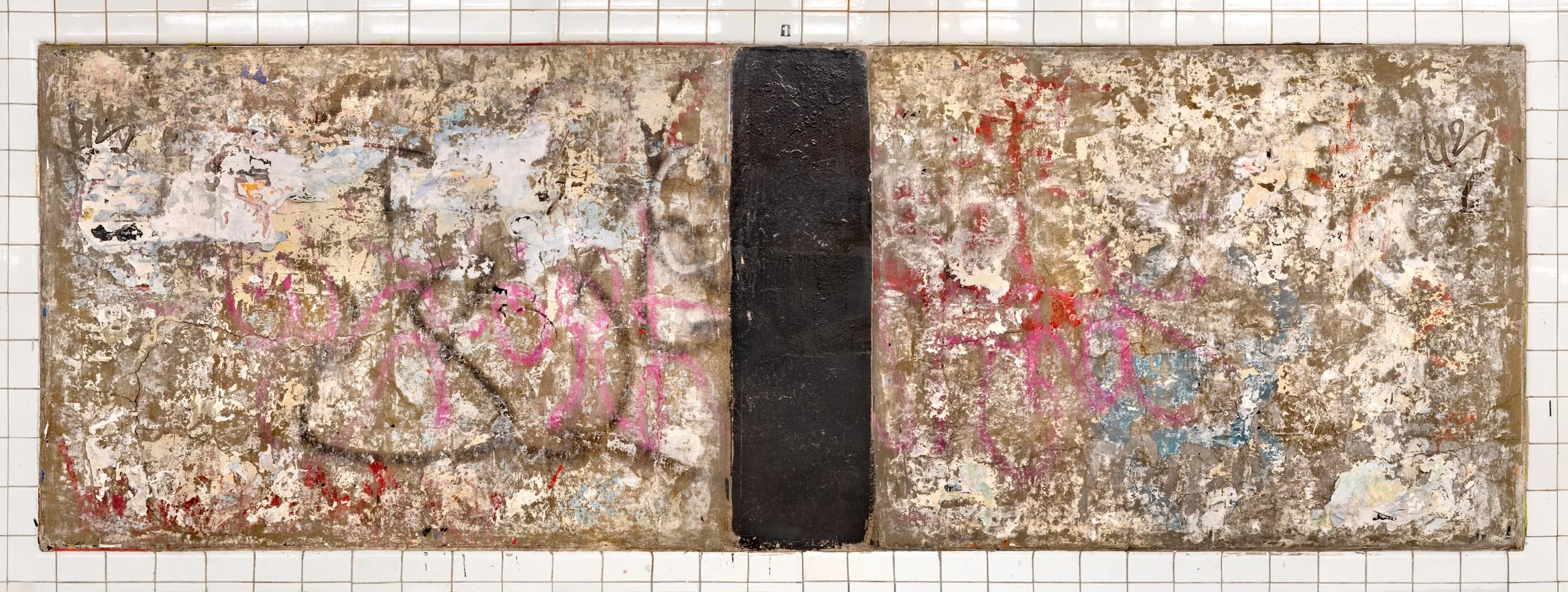 A "wall cut" or ad panel in the New York City subway, featuring a bare cement wall scraped of layers of posters with scraps of paper, chipped paint, and graffiti creating a densely textured composition reminiscent of abstract expressionist art.
