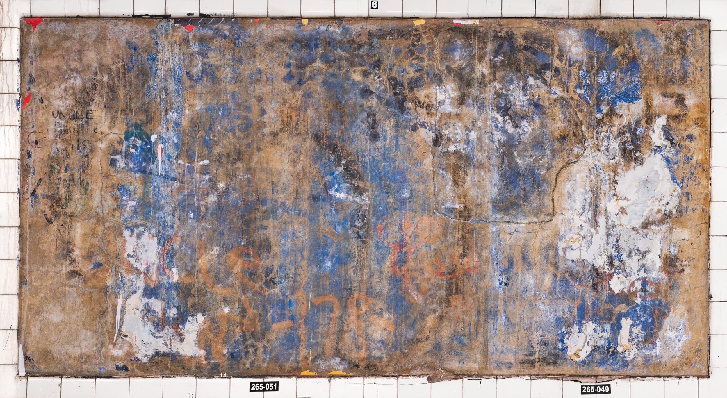 A photograph of a New York City subway advertising panel, showcasing urban decay transformed into fine art. Photographed by Barton Lewis, the image focuses on minimalist, painterly textures, poster fragments, heavily scraped surfaces and faded pigmen