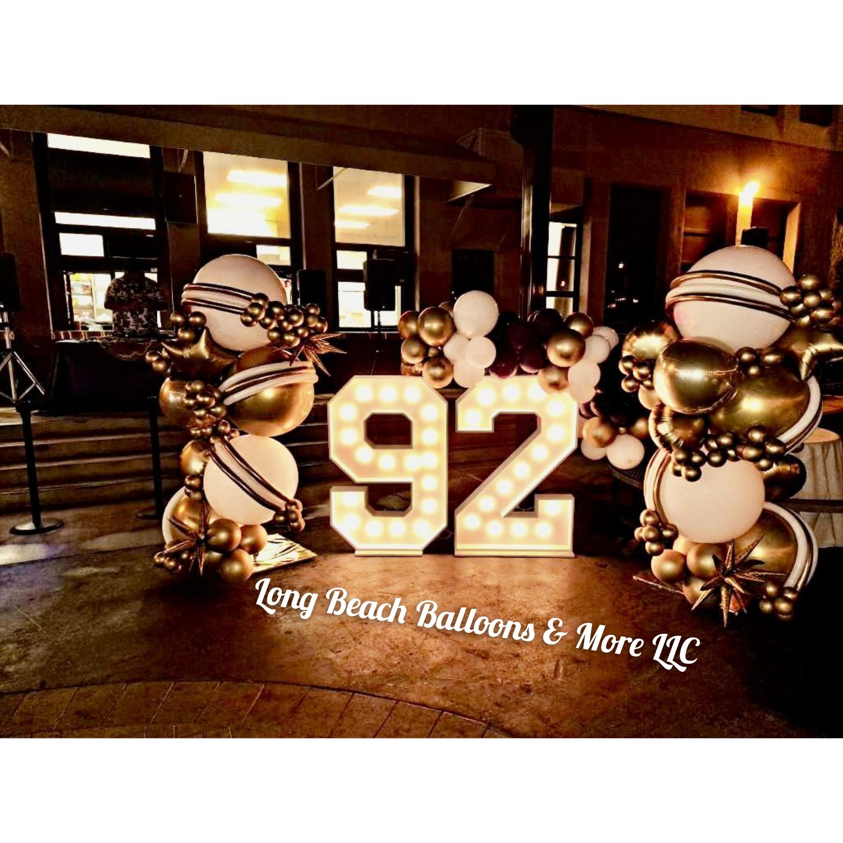 Balloon Galaxy Theme Columns with Marquee Light up Numbers at St. Anthony's School