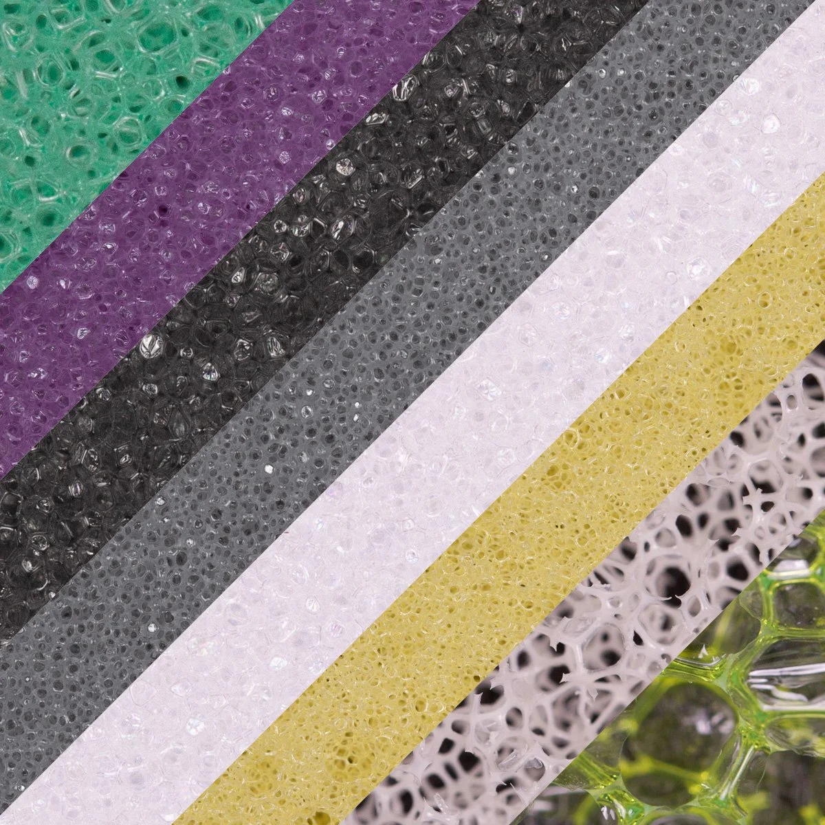 Close-up of various colorful foam sheets with a bubble-like texture, including green, purple, black, gray, white, yellow, and clear pieces.