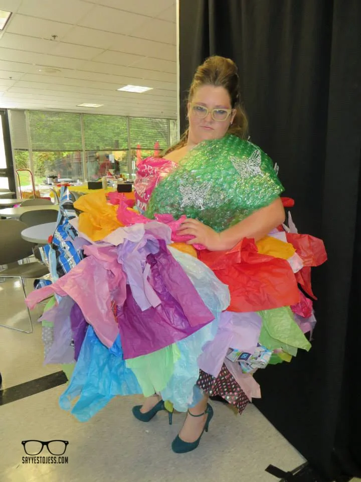 Cincinnati photographer Jess Summers wearing a colorful recycled tissue paper dress at her corporate trashion show