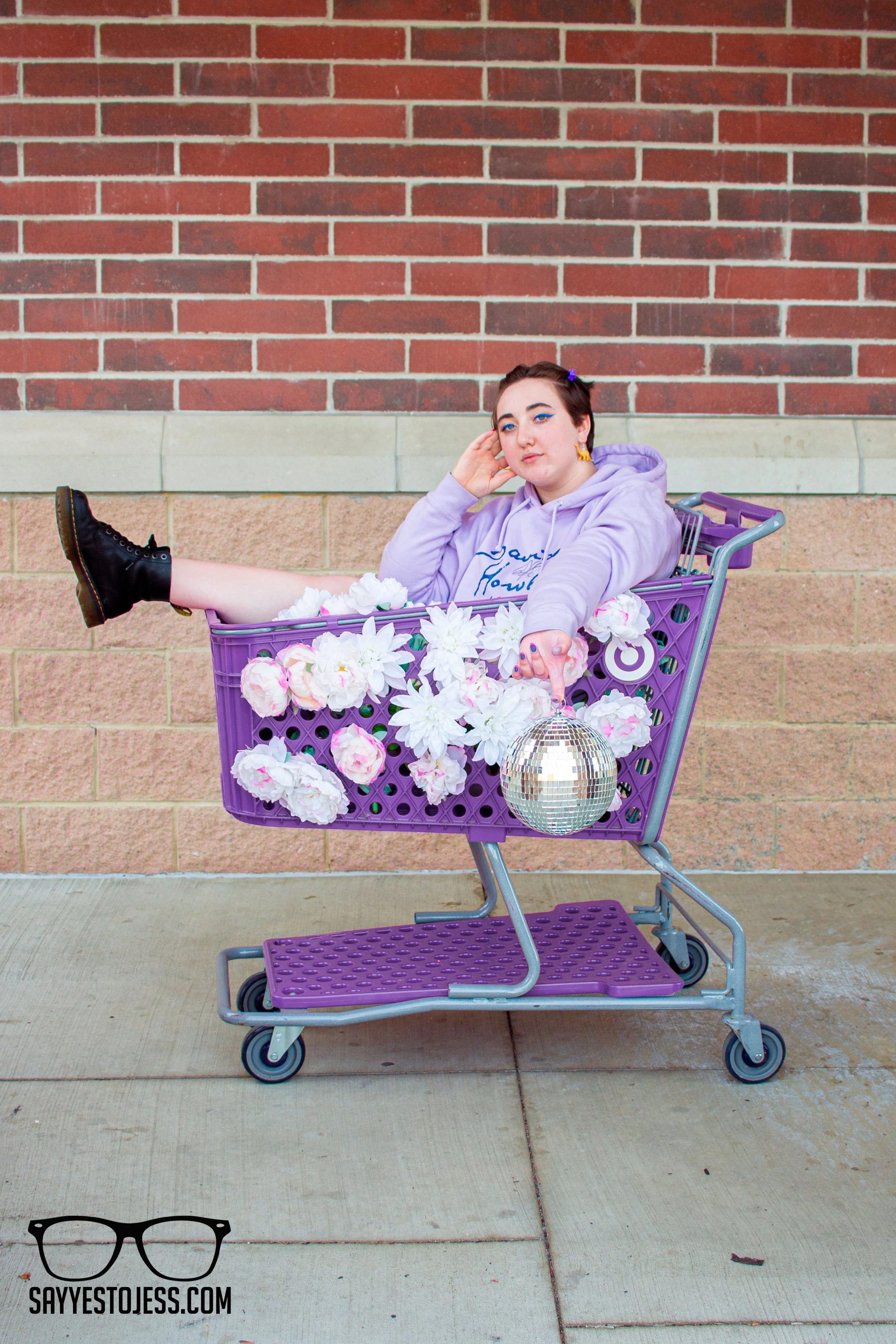 Fun senior portrait taken at Target showcasing personality during a unique senior photo session in Cincinnati