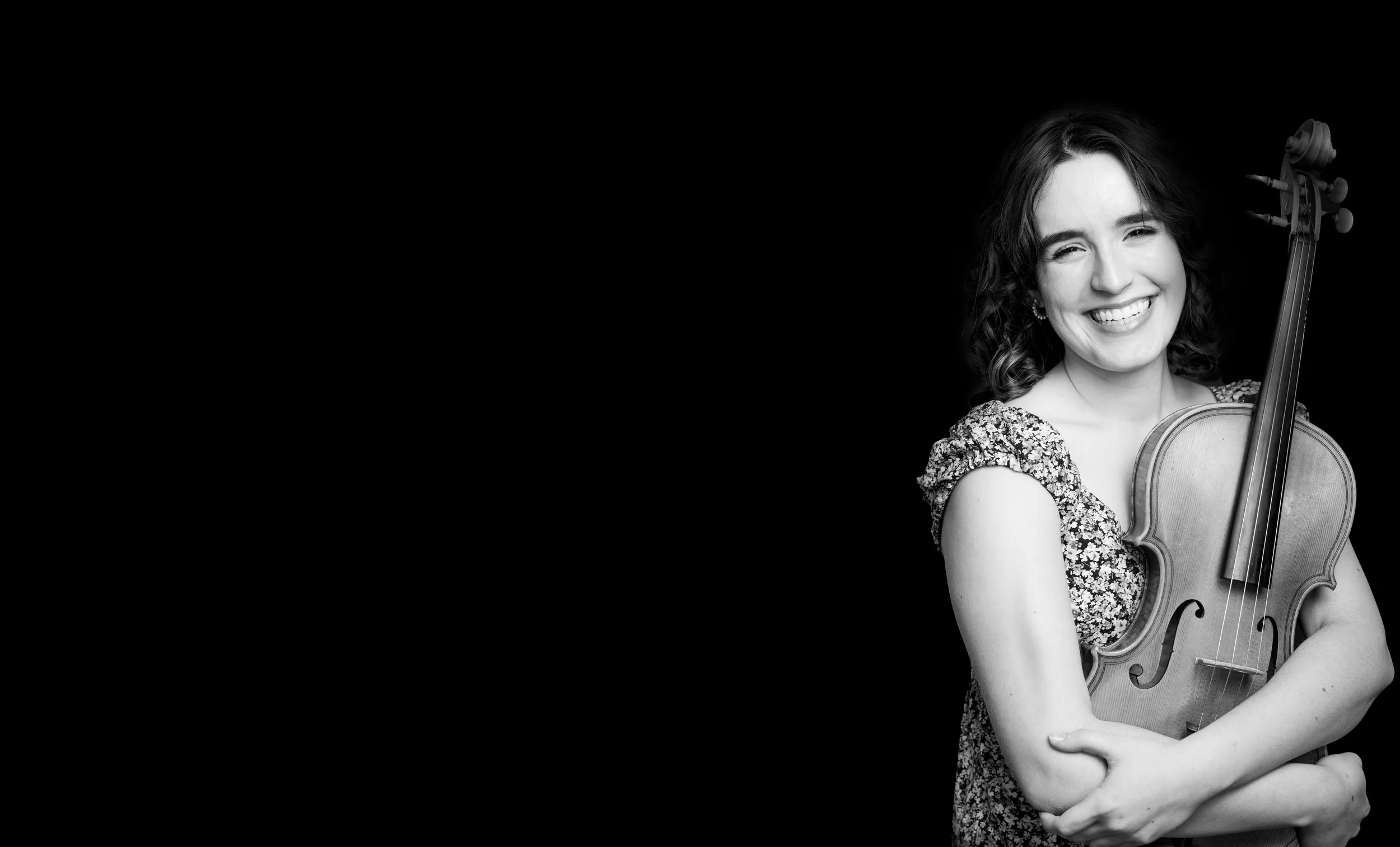 Senior portrait with dramatic moody studio lighting and bold shadows at Say Yes to Jess photography studio in Cincinnati