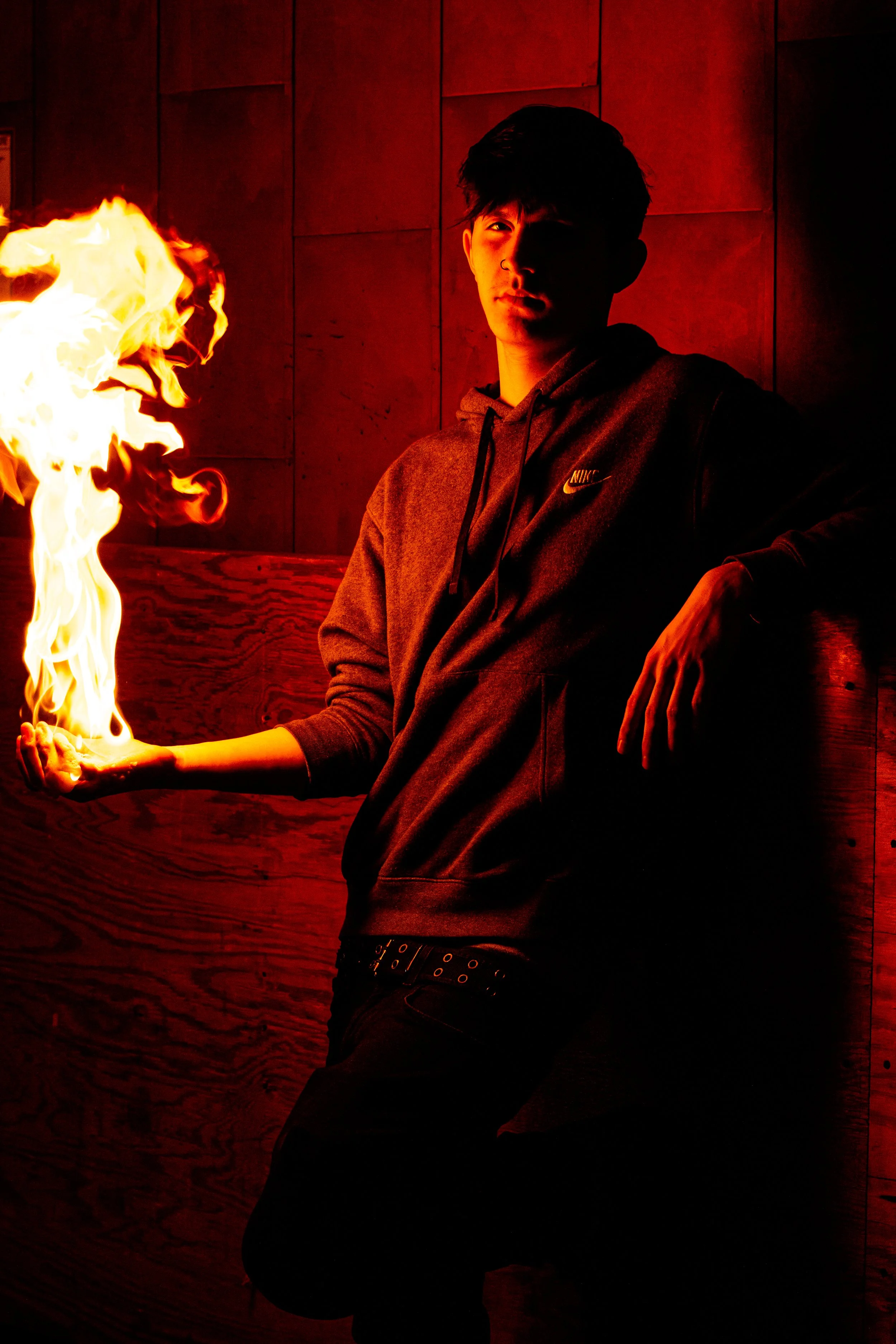 enior portrait with dramatic lighting and bold styling during a creative senior photo session at Say Yes to Jess in Cincinnati