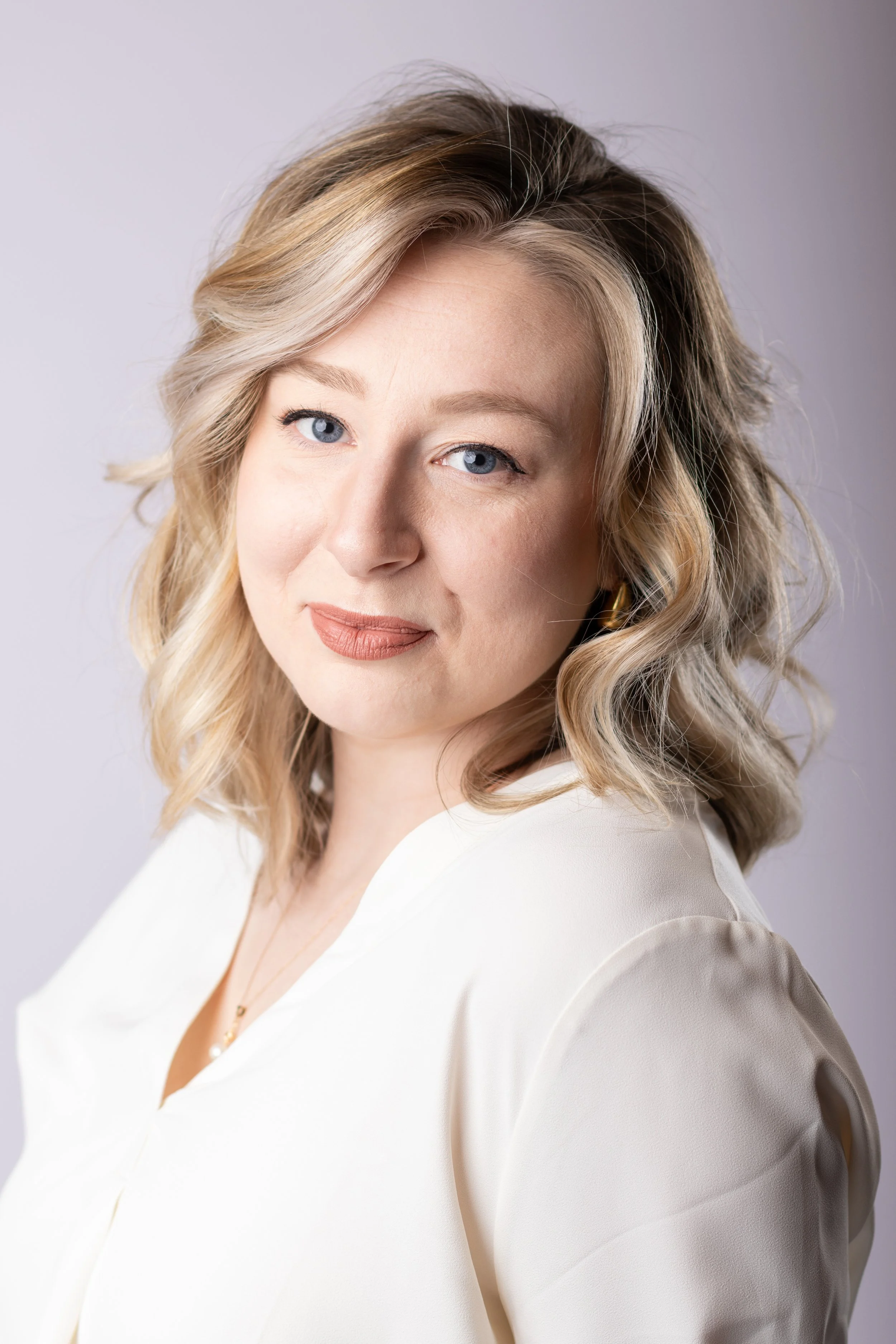 Professional headshot with confident expression and creative lighting at Say Yes to Jess photography studio in Cincinnati