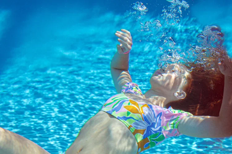 Creative outdoor senior portrait at a Cincinnati location with natural light and artistic posing by Say Yes to Jess