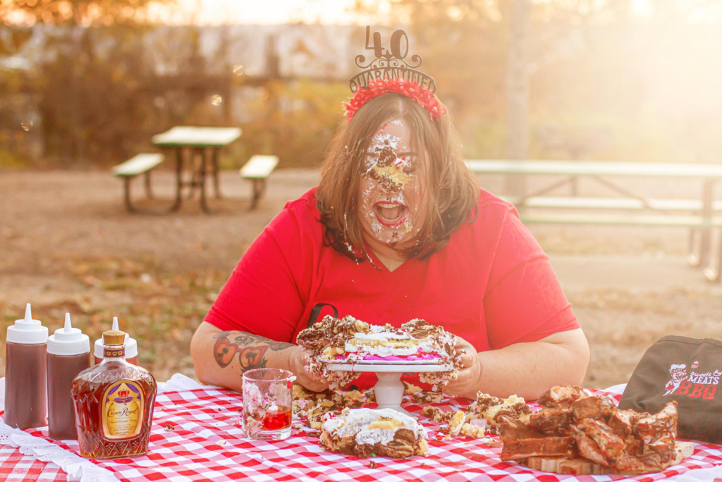 Cincinnati cake smash photographer capturing a 40th birthday adult cake smash session outdoors