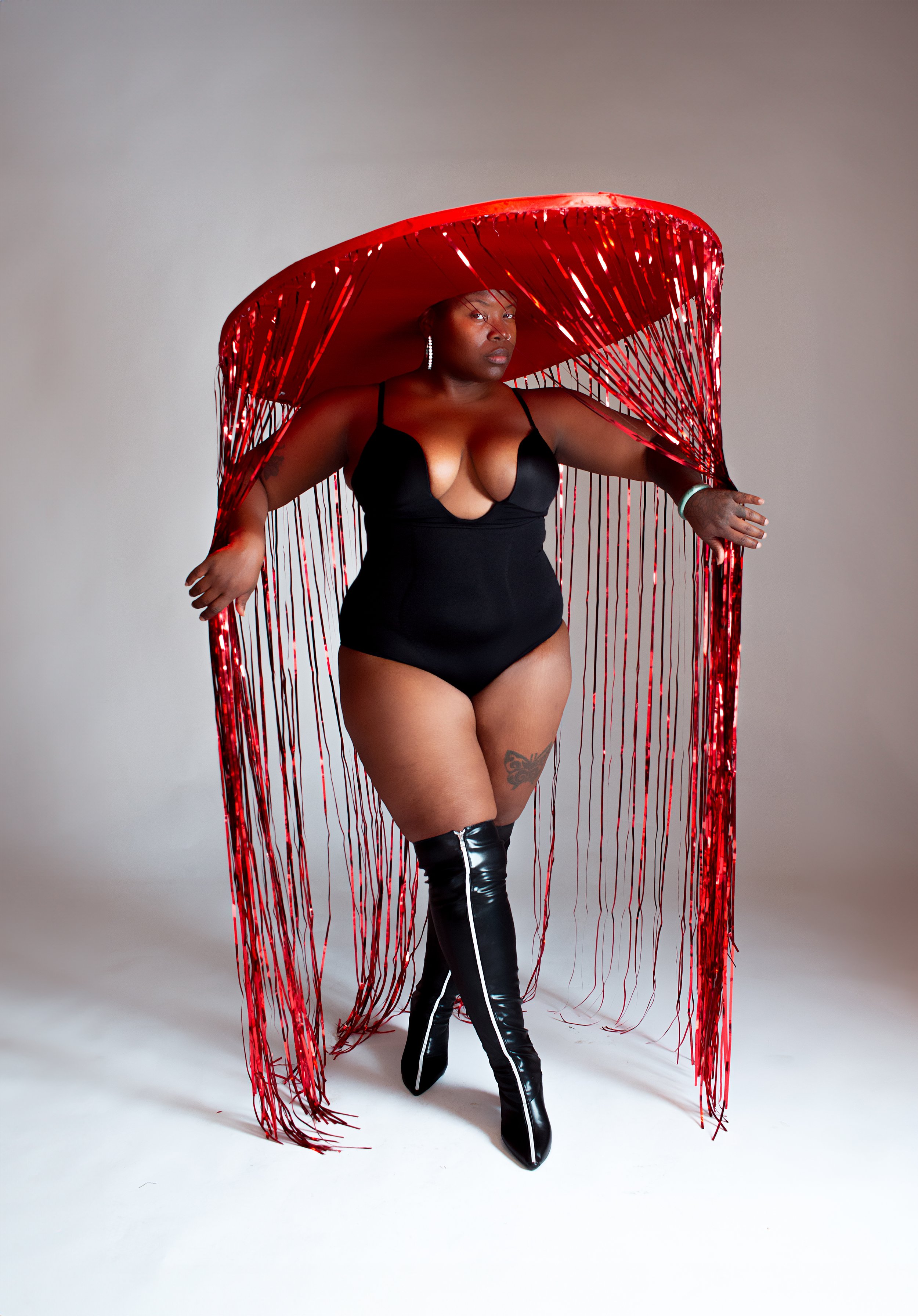 Bold empowering portrait of a woman during a Celebrate HER session with dramatic styling at Say Yes to Jess in Cincinnati Ohio