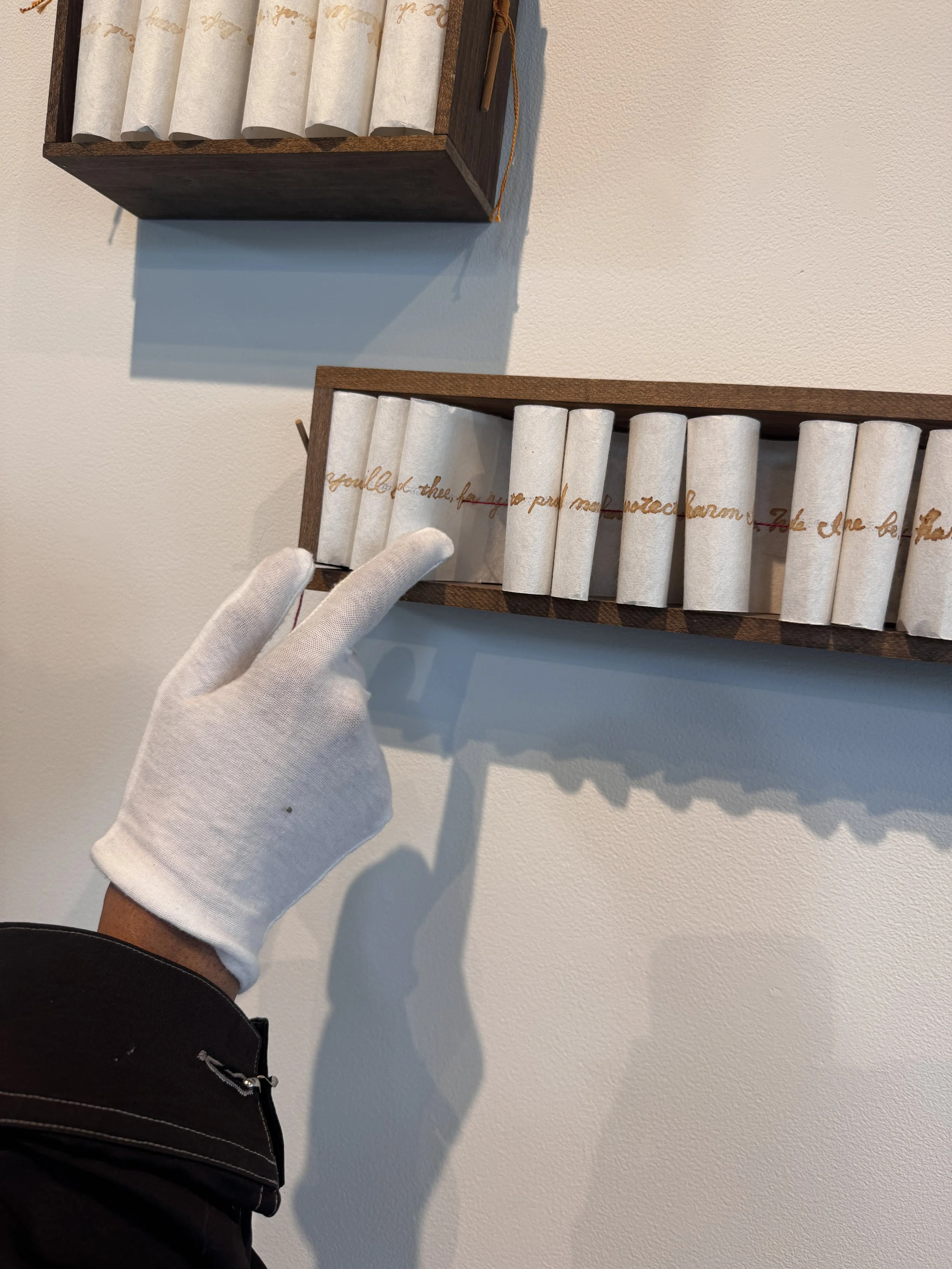  Partial view of Naomi Kasumi,   Secret Collection #6 Forma Magiche  , 2013.Mixed media (Japanese washi paper, wood, colored thread, Bamboo stick, ink, invisible ink, fire).  