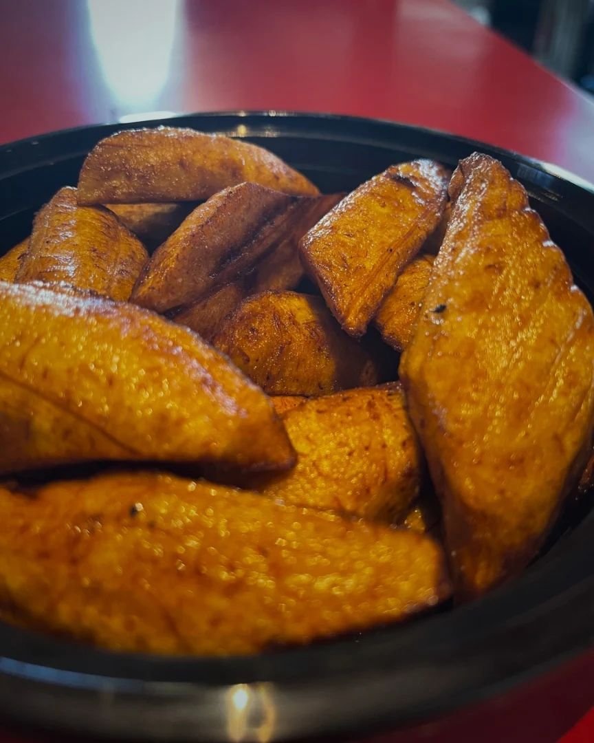 Crispy, golden perfection awaits with our Fried Plantain! Sweet, caramelized slices that melt in your mouth with every bite. Elevate your meal with this Caribbean delight! #FriedPlantain #CaribbeanEats #DaChickenCribb