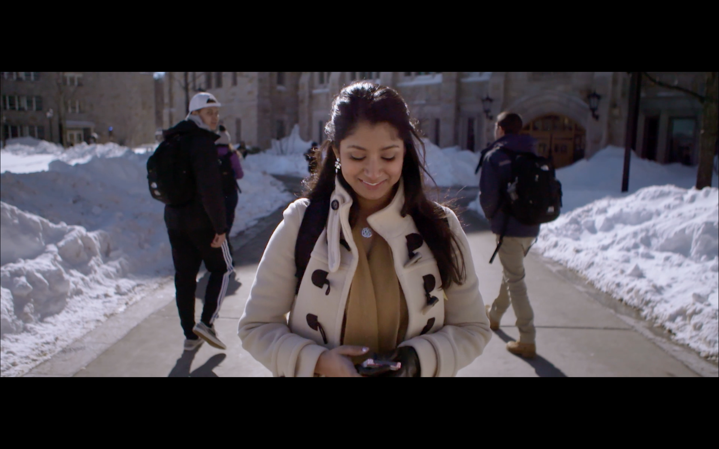 Shanzi walking on phone.png