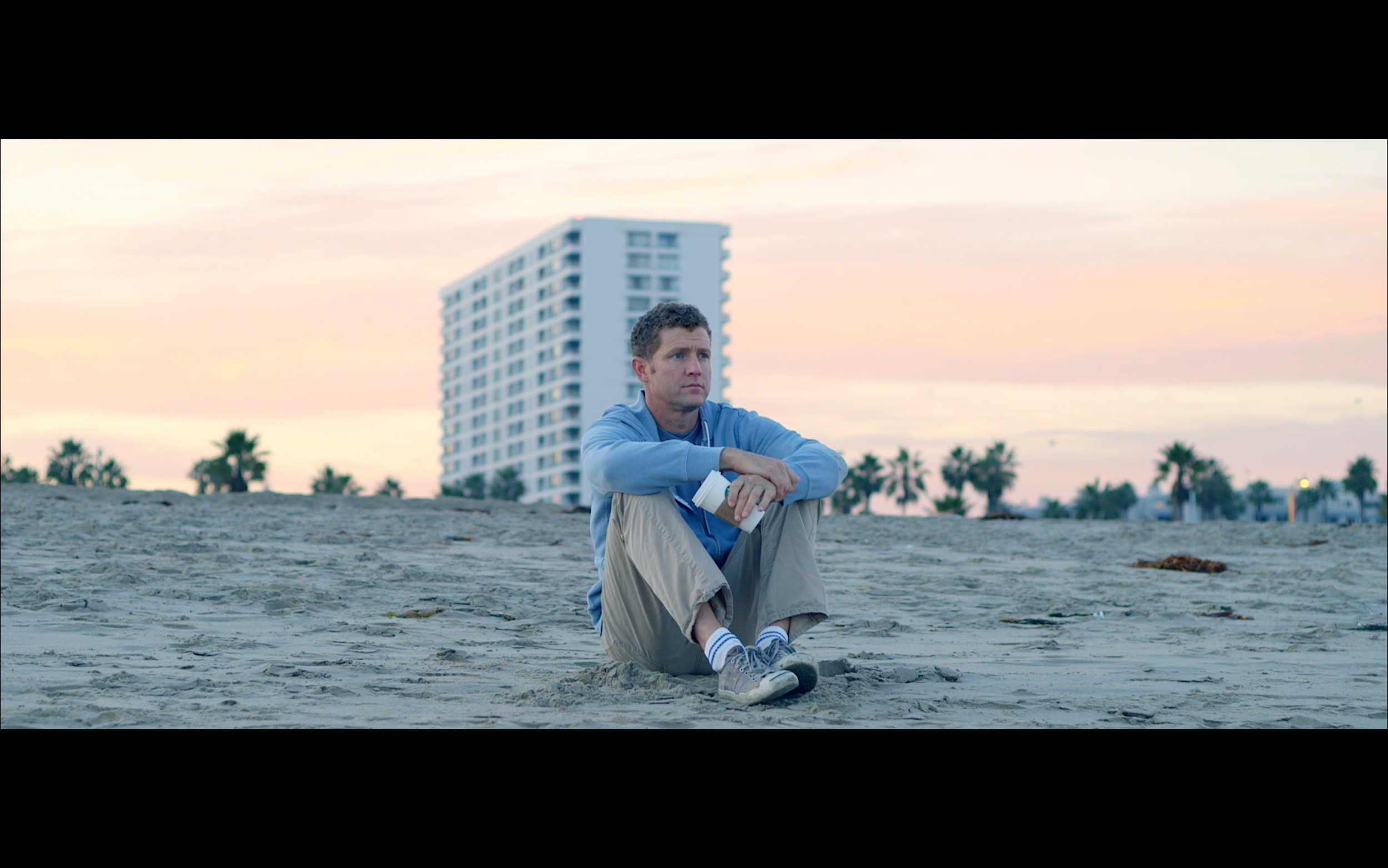 Bloke single on beach.png