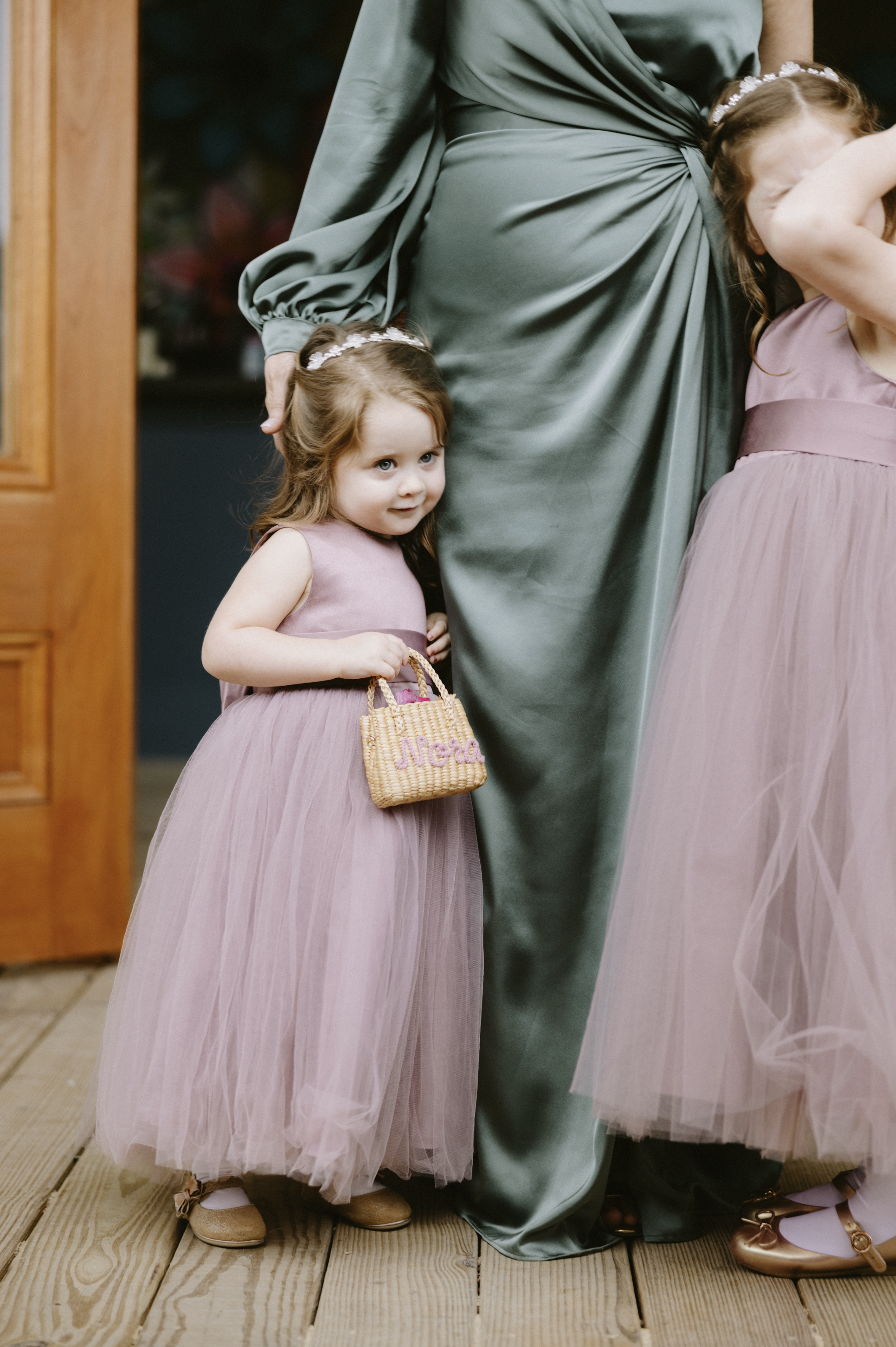 Flower girls with their mom before the ceremony
