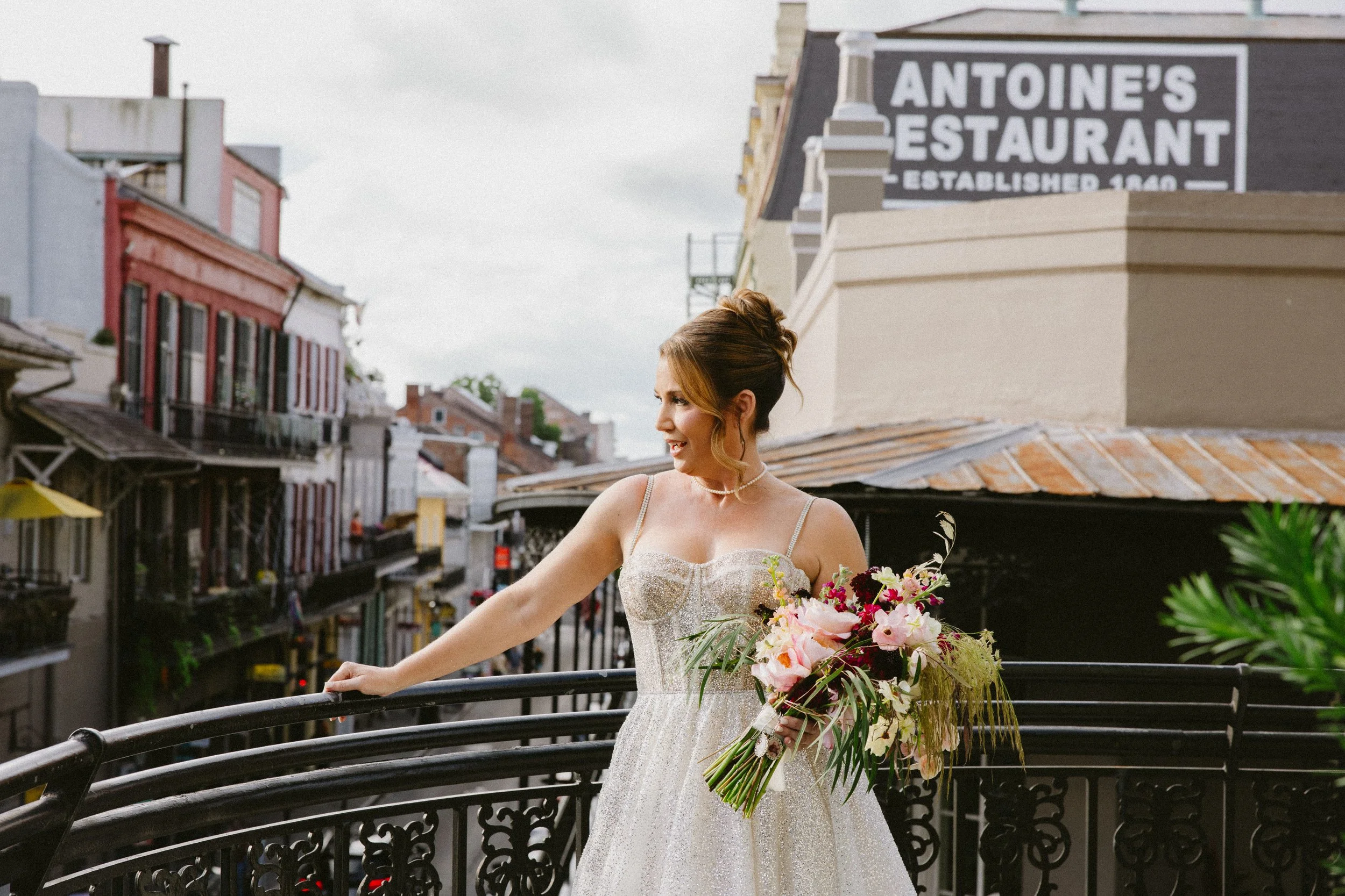 Bride overlooking the french quarter in new orleans