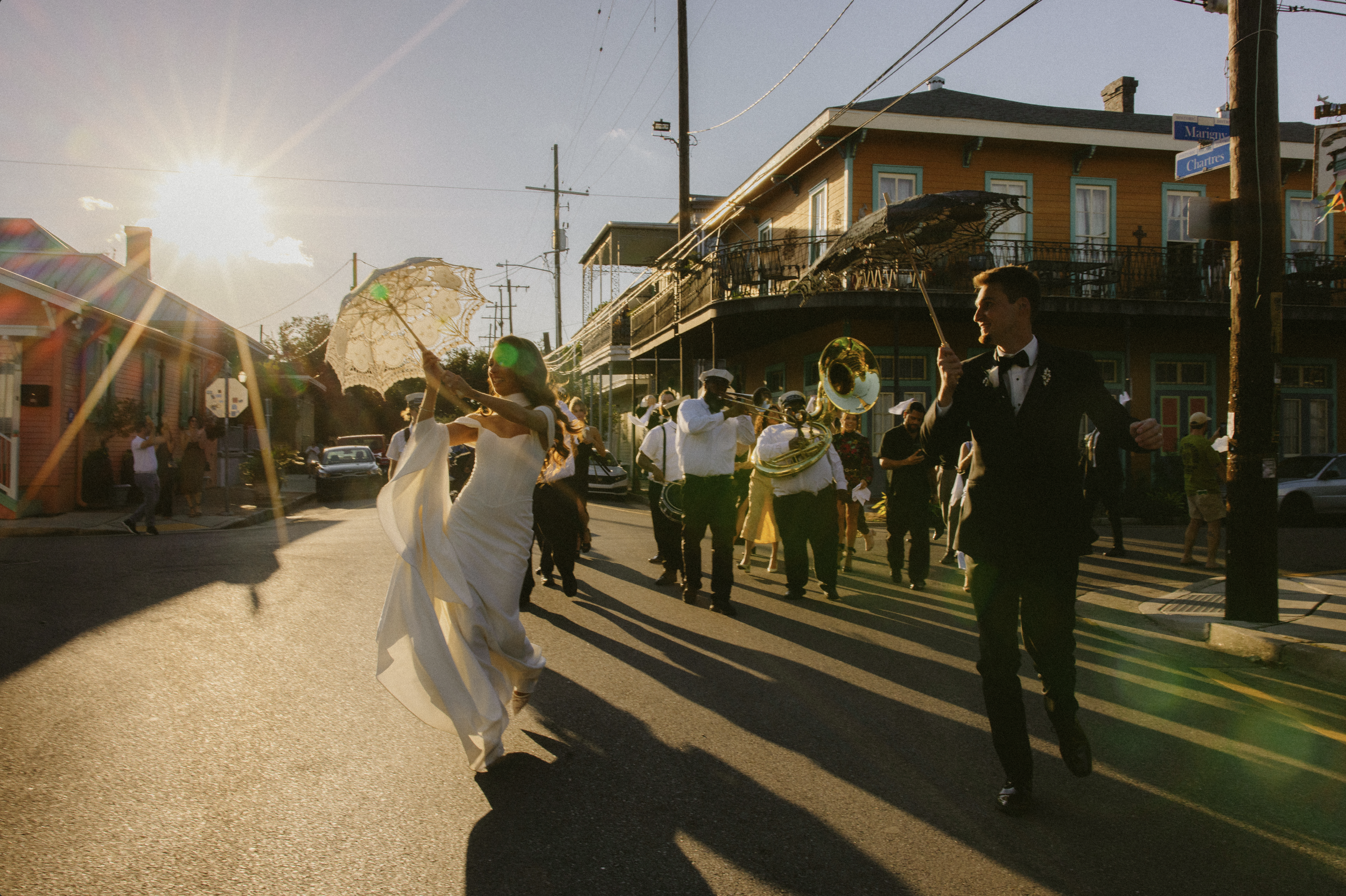 Bride and groom dancing during their second line in New Orleans